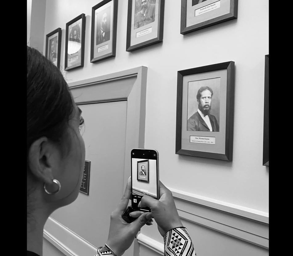 Hana-Rawhiti Maipi-Clarke snaps a photo of her great-great-great-great-grandfather, Wiremu Katene, New Zealand's first Māori minister in Parliament.