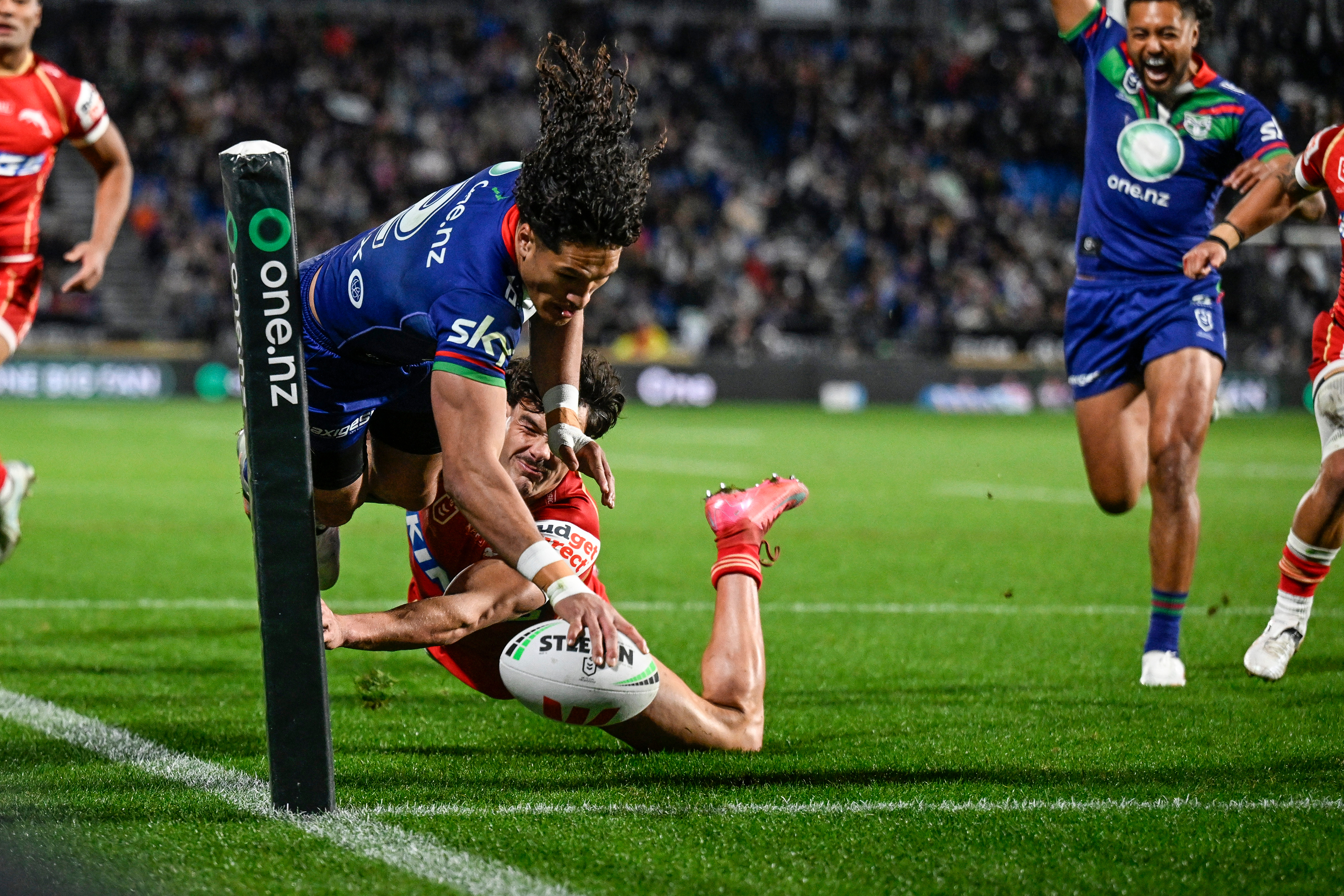 Dallin Watene-Zelezniak scores against the Dolphins. Photo / Photosport
