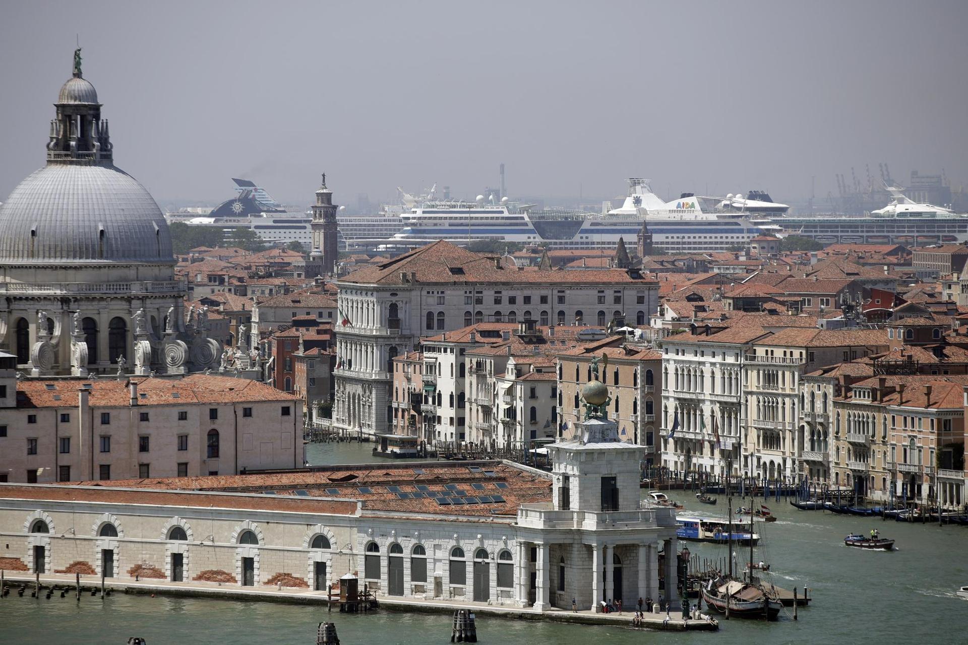 Cruise ships are moored at Venice harbor: Culture Minister Franceschini said the ban will take effect next month. Photo / Luca Bruno AP