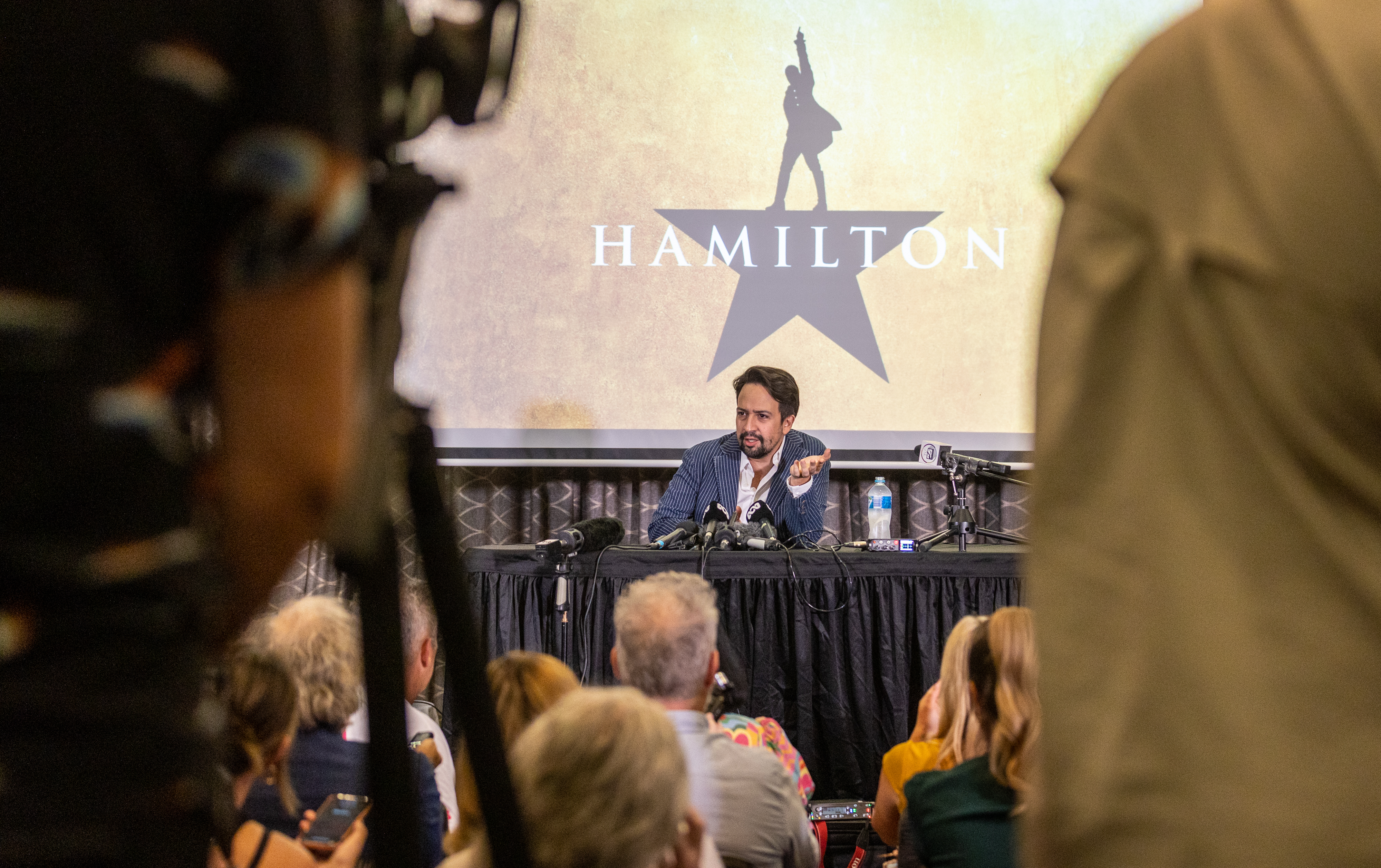Lin-Manuel Miranda faces an adoring media contingent in Brisbane.