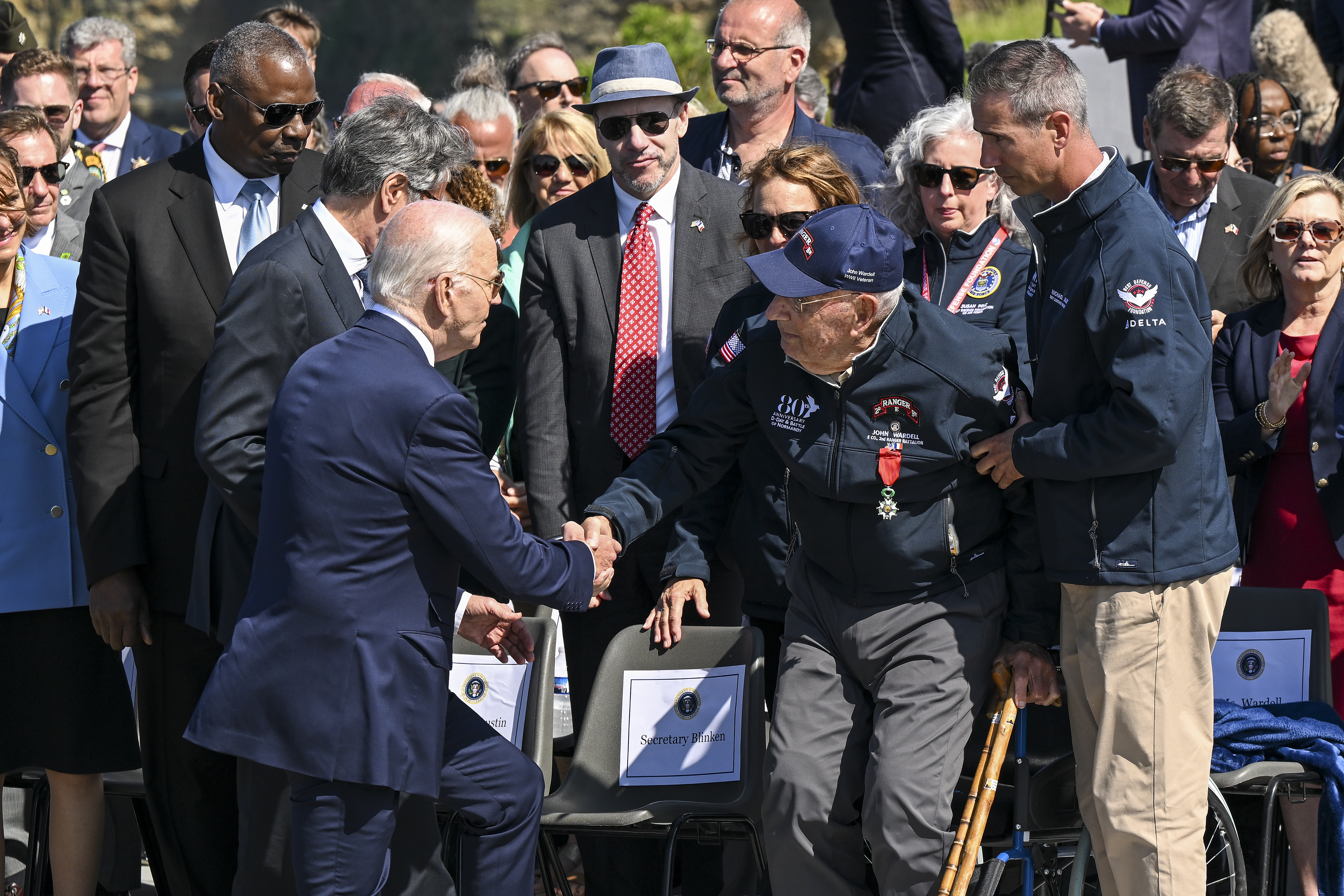 Joe Biden greets WWII veterans during D-Day commemorations at the Pointe du Hoc Ranger Monument in Normandy, France, on June 7, 2024. Photo / Kenny Holston, The New York Times