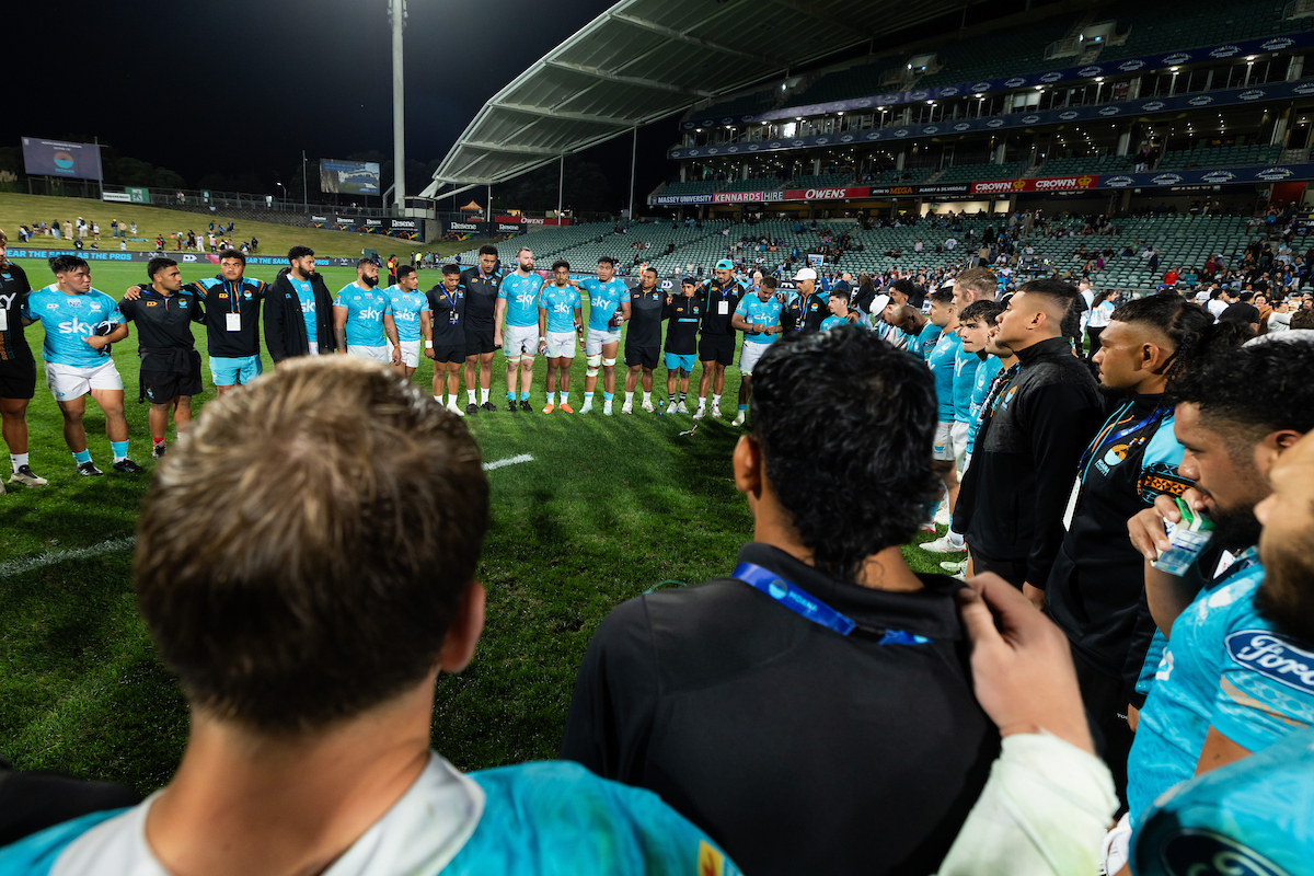 Moana Pasifika players in a huddle after a clash against the Crusaders at North Harbour Stadium. Photo / Photosport