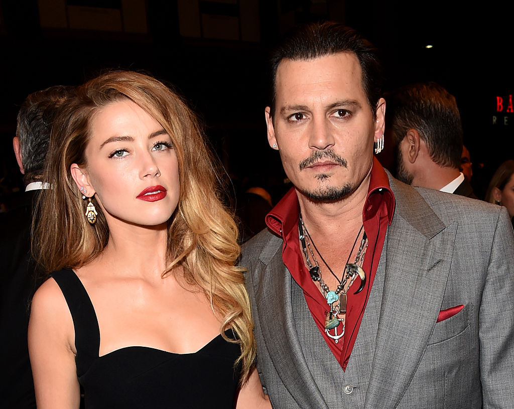 Amber Heard with Johnny Depp in 2015. Photo / Getty Images

