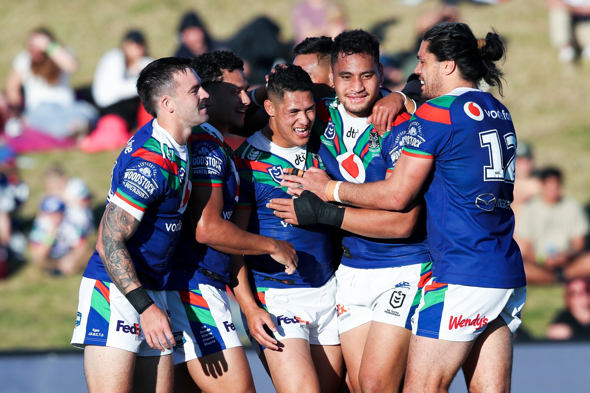 Warriors celebrate a try during the Covid era. Photo / Photosport