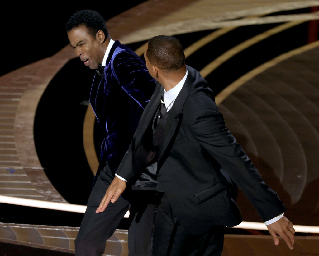 Chris Rock appears to be struck by Will Smith on stage. Photo / Getty Images