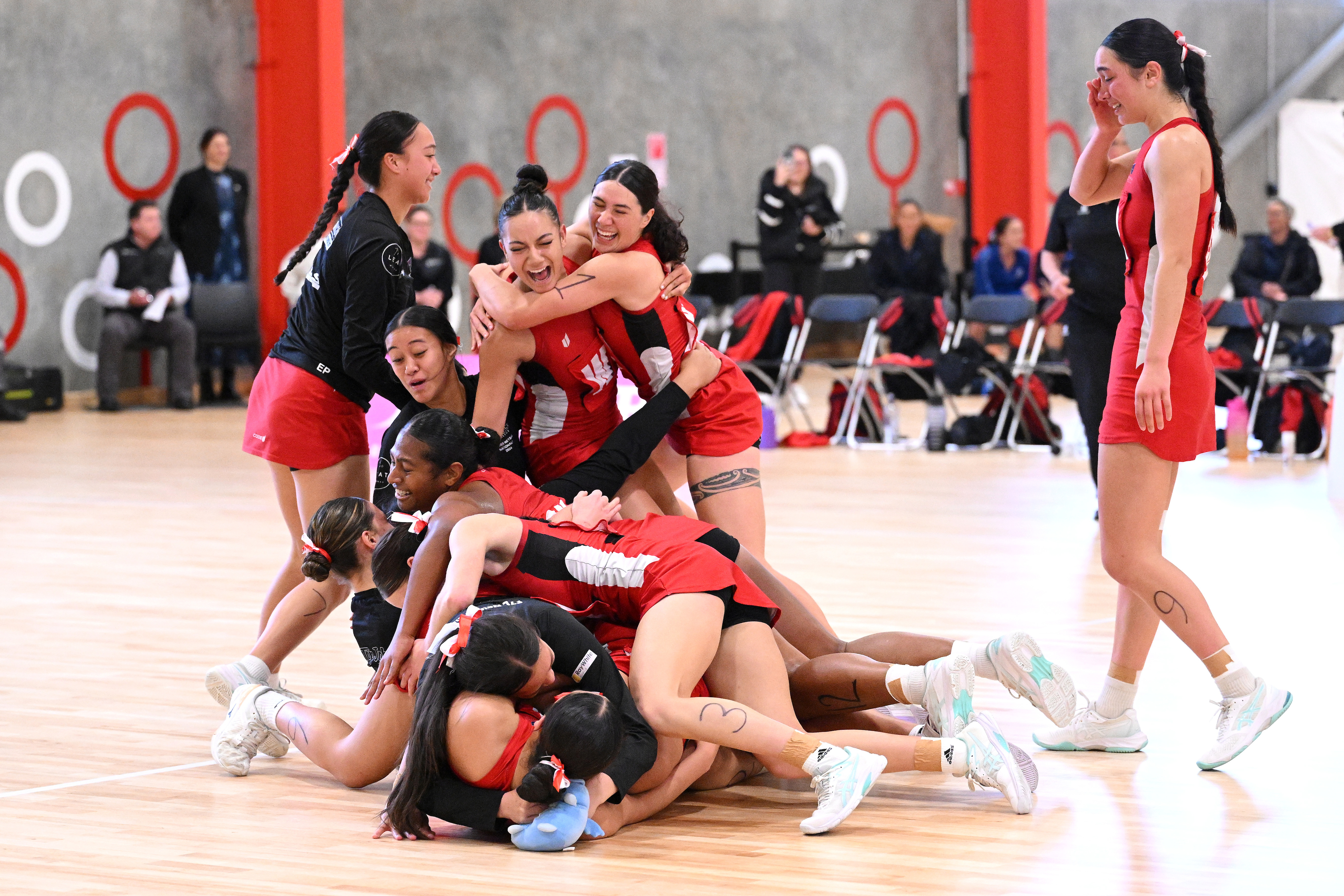 Ecstasy for Howick College after claiming the national netball crown, the school's third major title in 2024. Photo / Joe Allison, Michael Bradley Photography