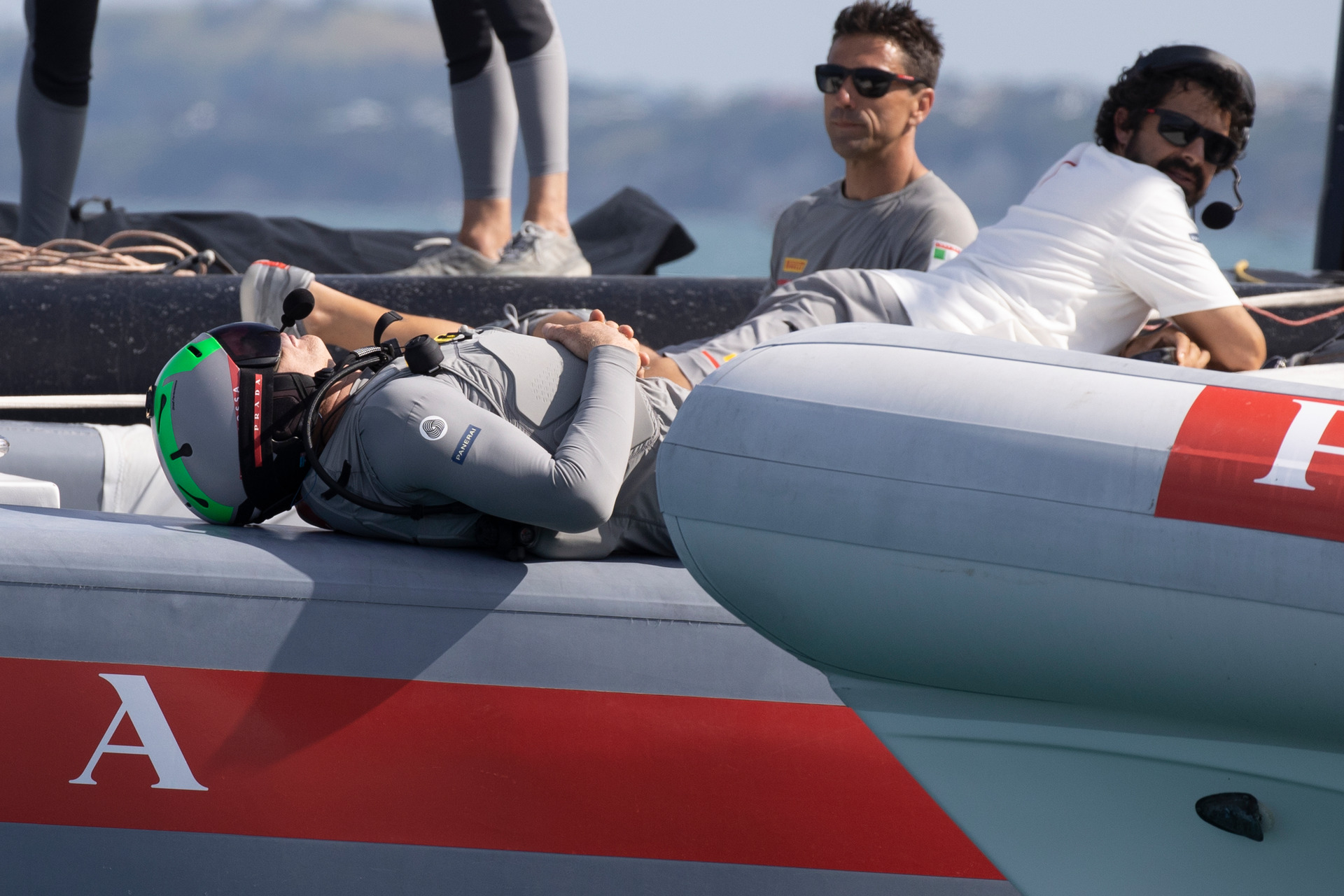 Luna Rossa helmsman Jimmy Spithill relaxes during the Christmas Cup. Photo / Brett Phibbs