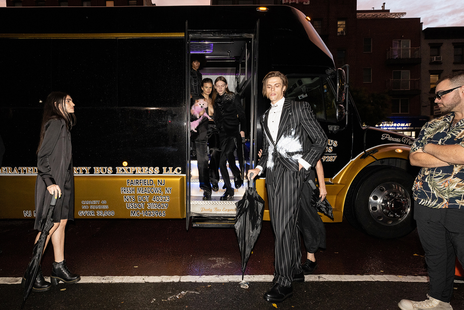 Models arrived by party bus to Anna Sorokin’s apartment building. Photo / Rebecca Smeyne, The New York Times
