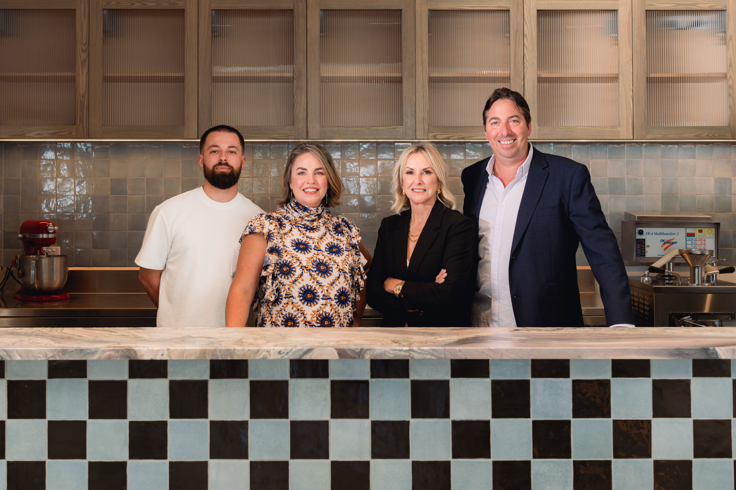 Brand manager Jack Tabron, operations manager Amy Burton, owner Judith Tabron and business partner Steve Mann, the team behind First Mates, Last Laugh. Photo / Kayle Lawson