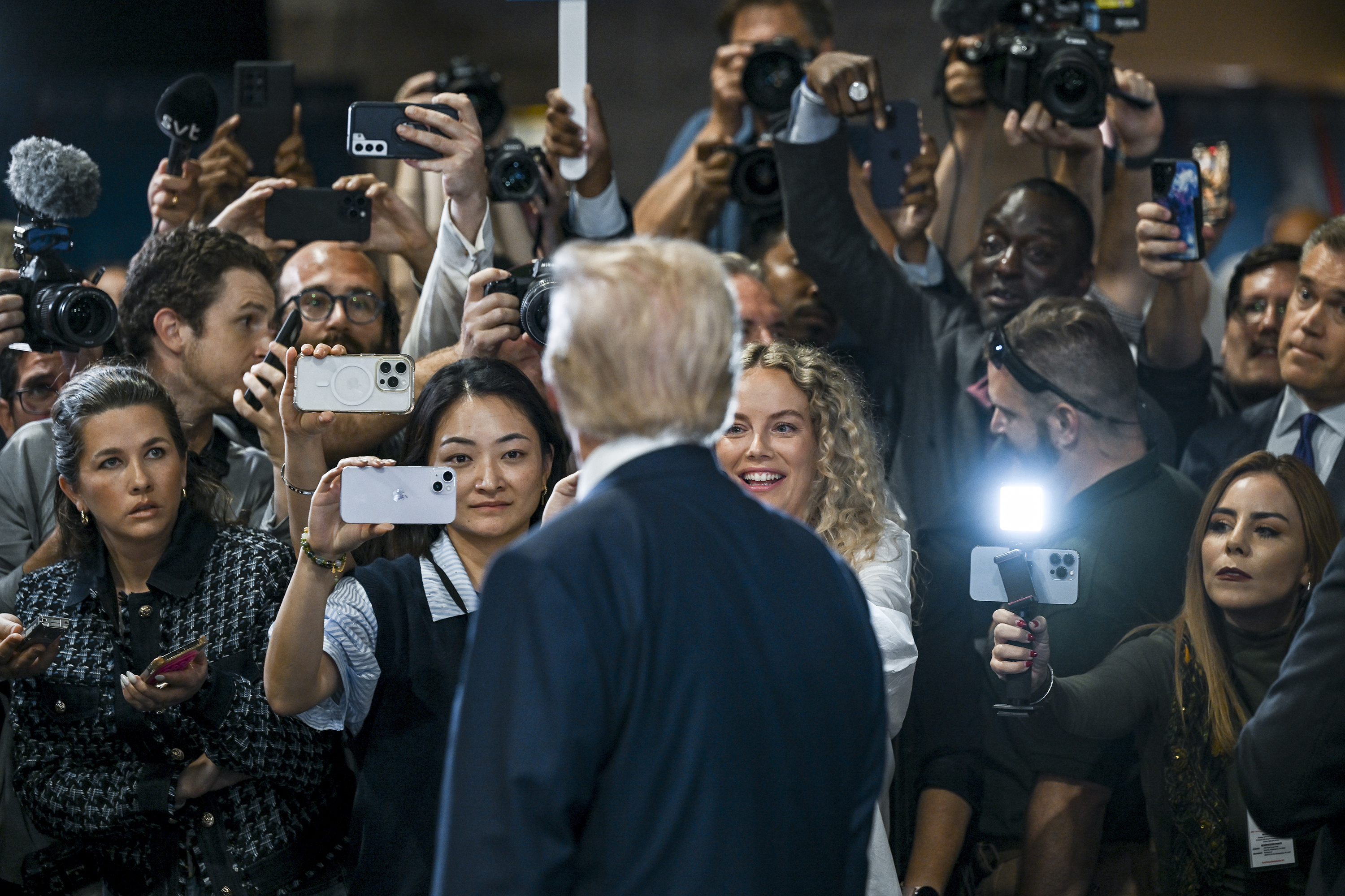 Donald Trump speaks to media in the Spin Room after the presidential debate against Kamala Harris. Photo / NY Times