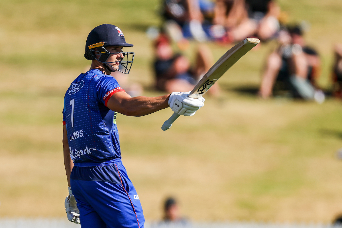 Bevon Jacobs raises his bat for a half-century against Northern Districts. Photo / Photosport