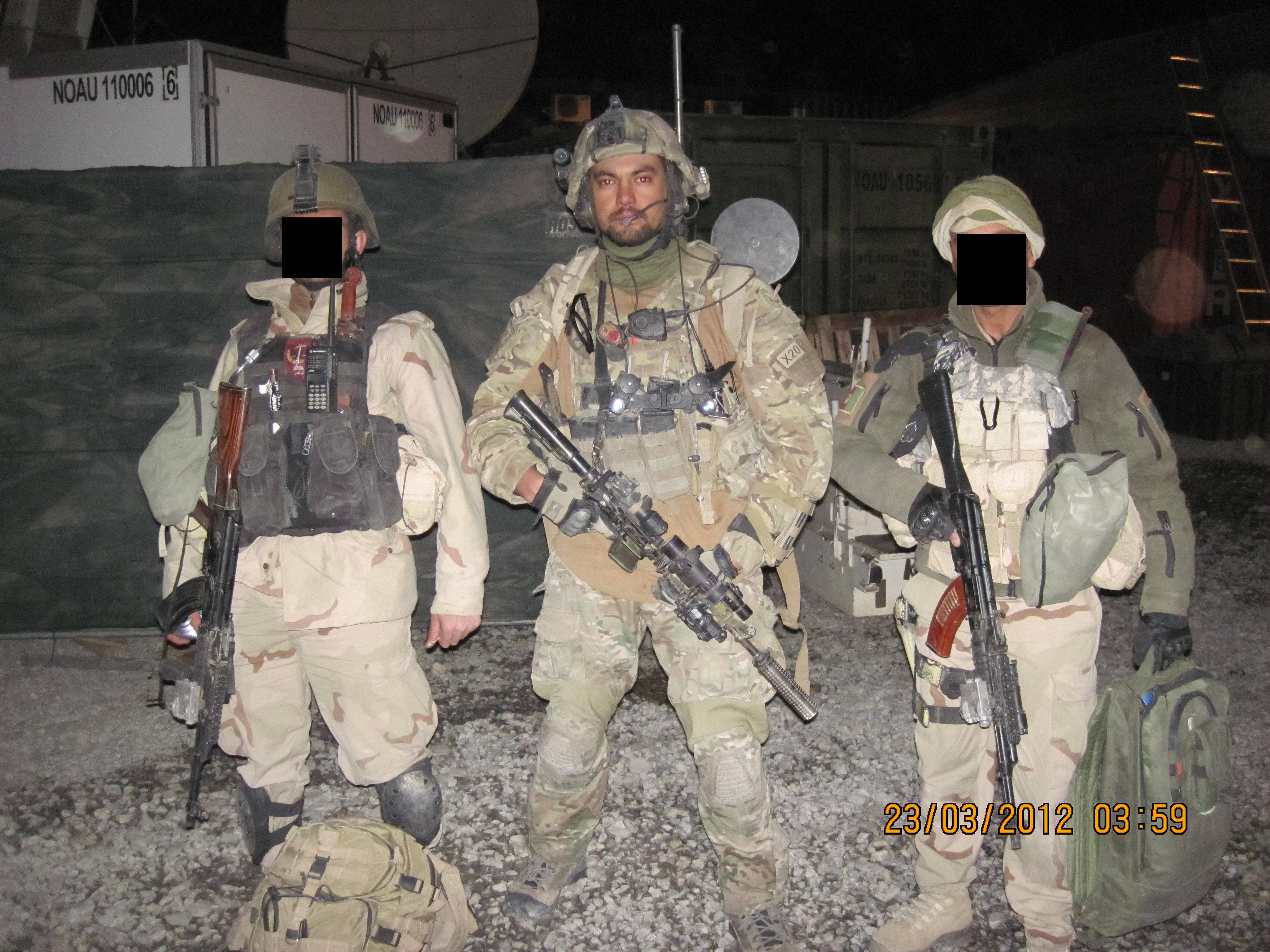 NZSAS Lance Corporal Nik Kahotea, standing between local soldiers trained in Afghanistan.