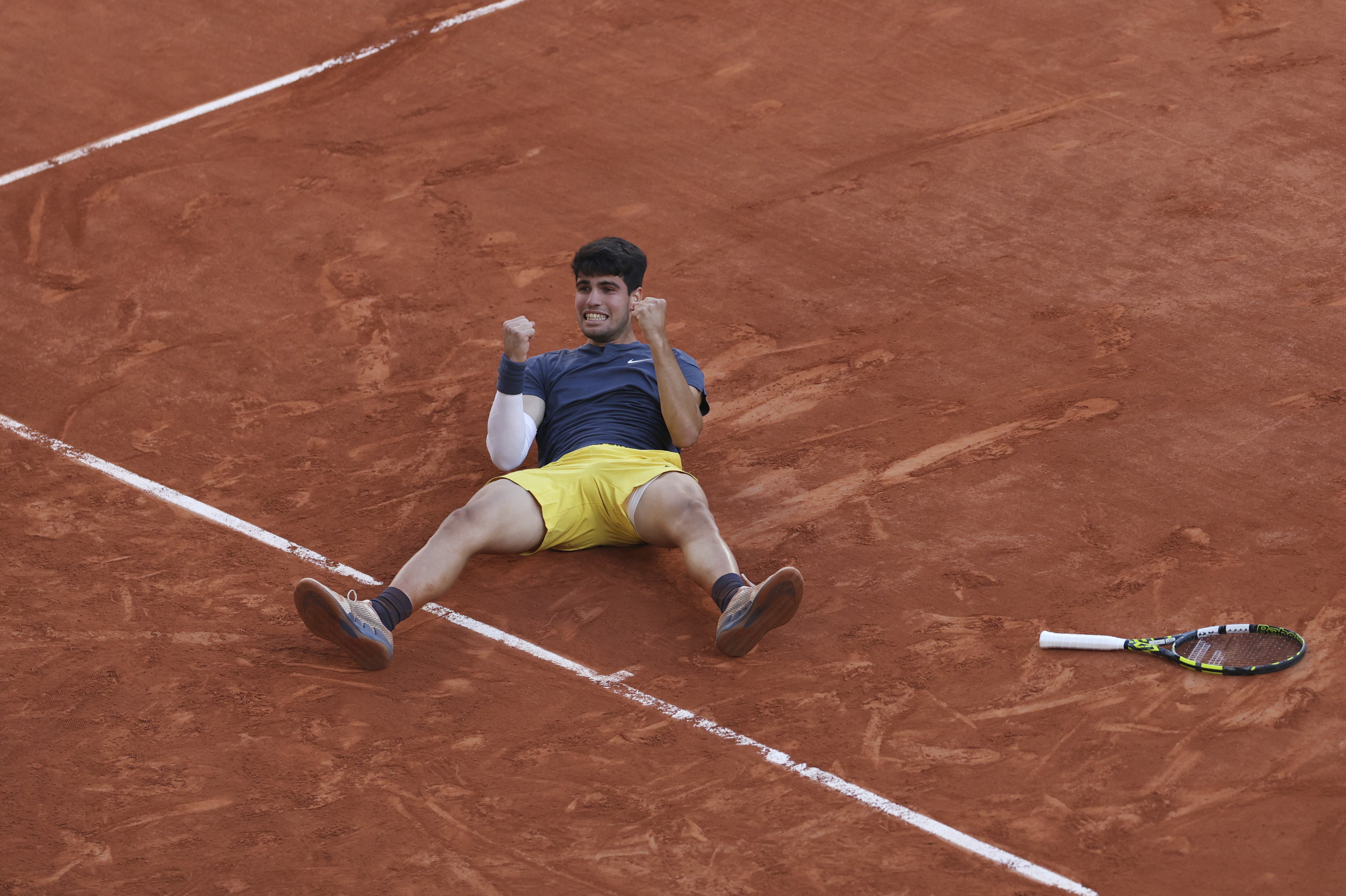 Spain's Carlos Alcaraz celebrates as he won the men's final match of the French Open tennis tournament against Germany's Alexander Zverev. Photo / AP