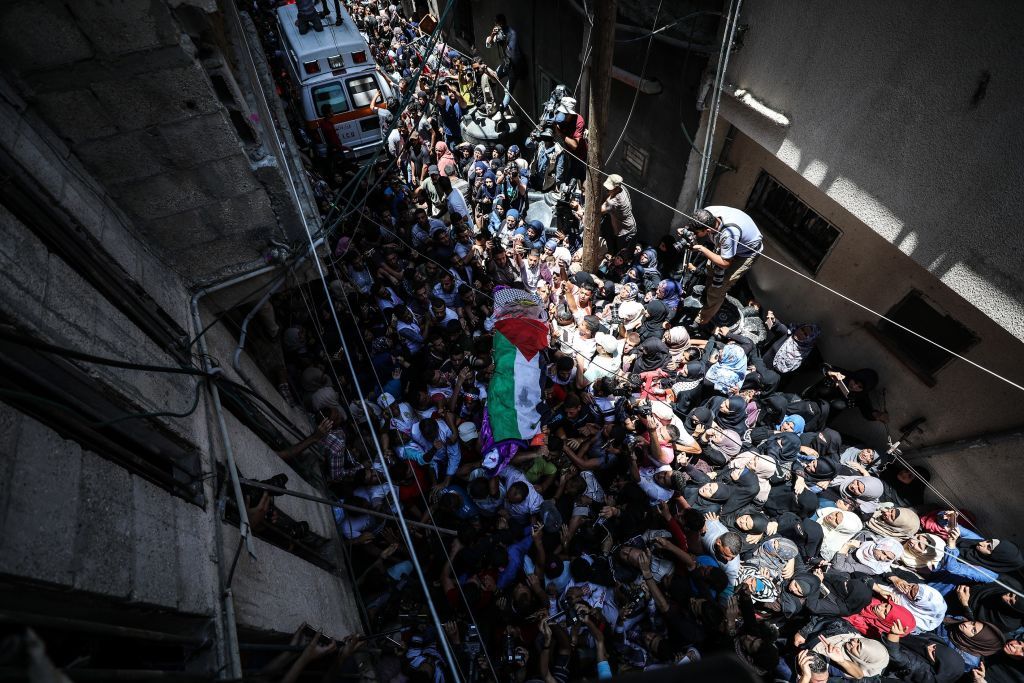 Palestinians attend the funeral ceremony of Razan Ashraf Najjar, 21, who was shot dead by Israeli forces. Photo / AP