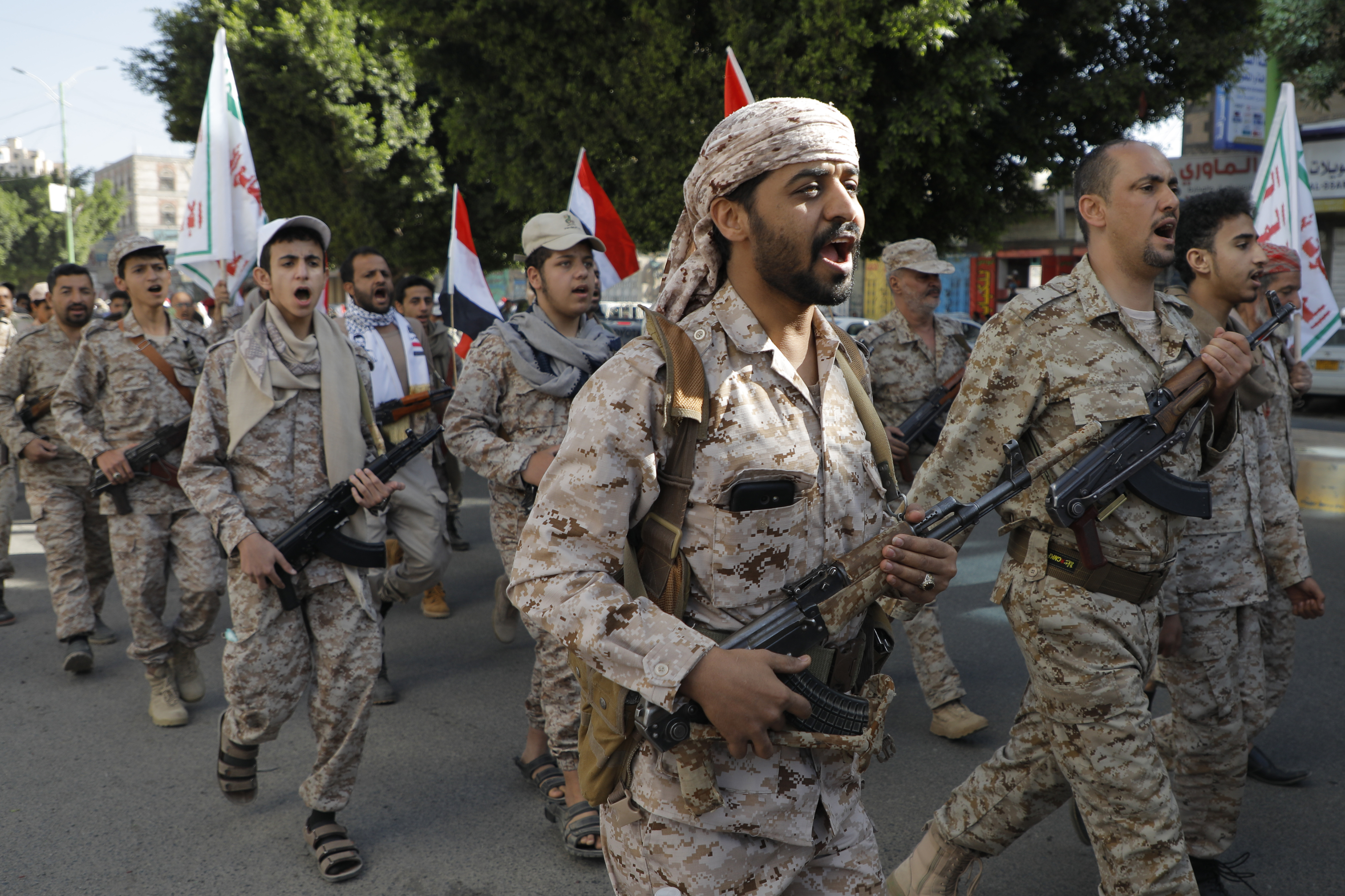Houthi supporters march in Sanaa, Yemen, to mark the anniversary of Yemeni unity. Photo / AP