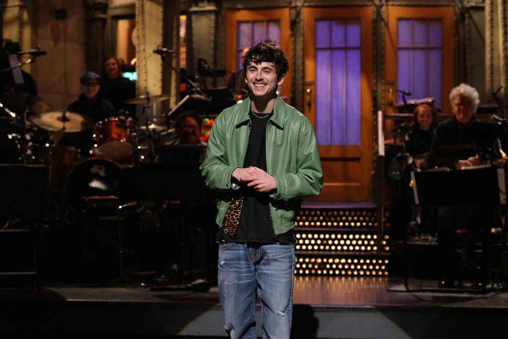 Timothee Chalamet pulled a double shift on Saturday Night Live, hosting as himself and singing like Bob Dylan. Photo / Getty Images