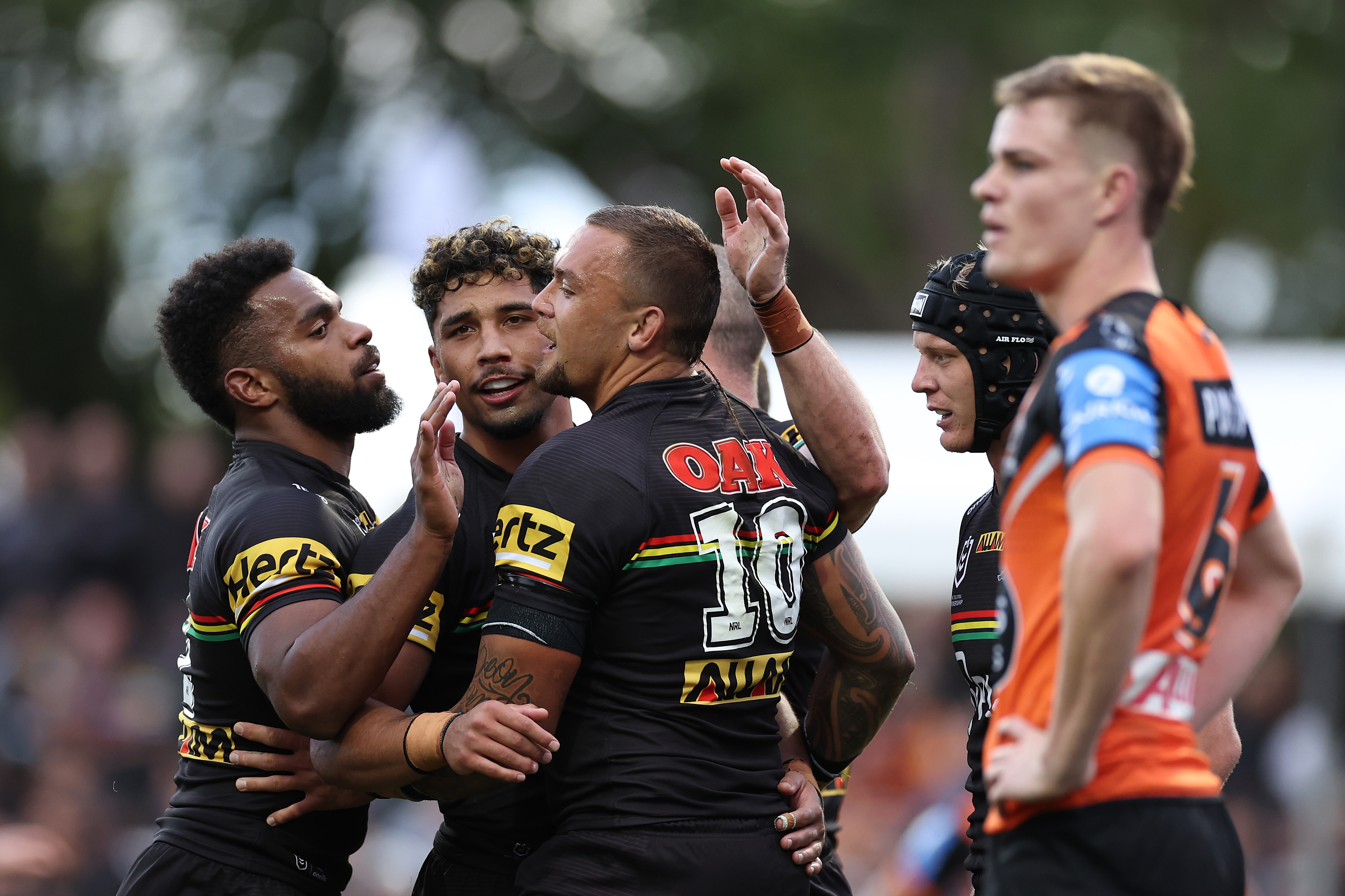 James Fisher-Harris (centre) scored the last try in the Penrith Panthers' 22-6 win over the Wests Tigers. Photo / Getty Images