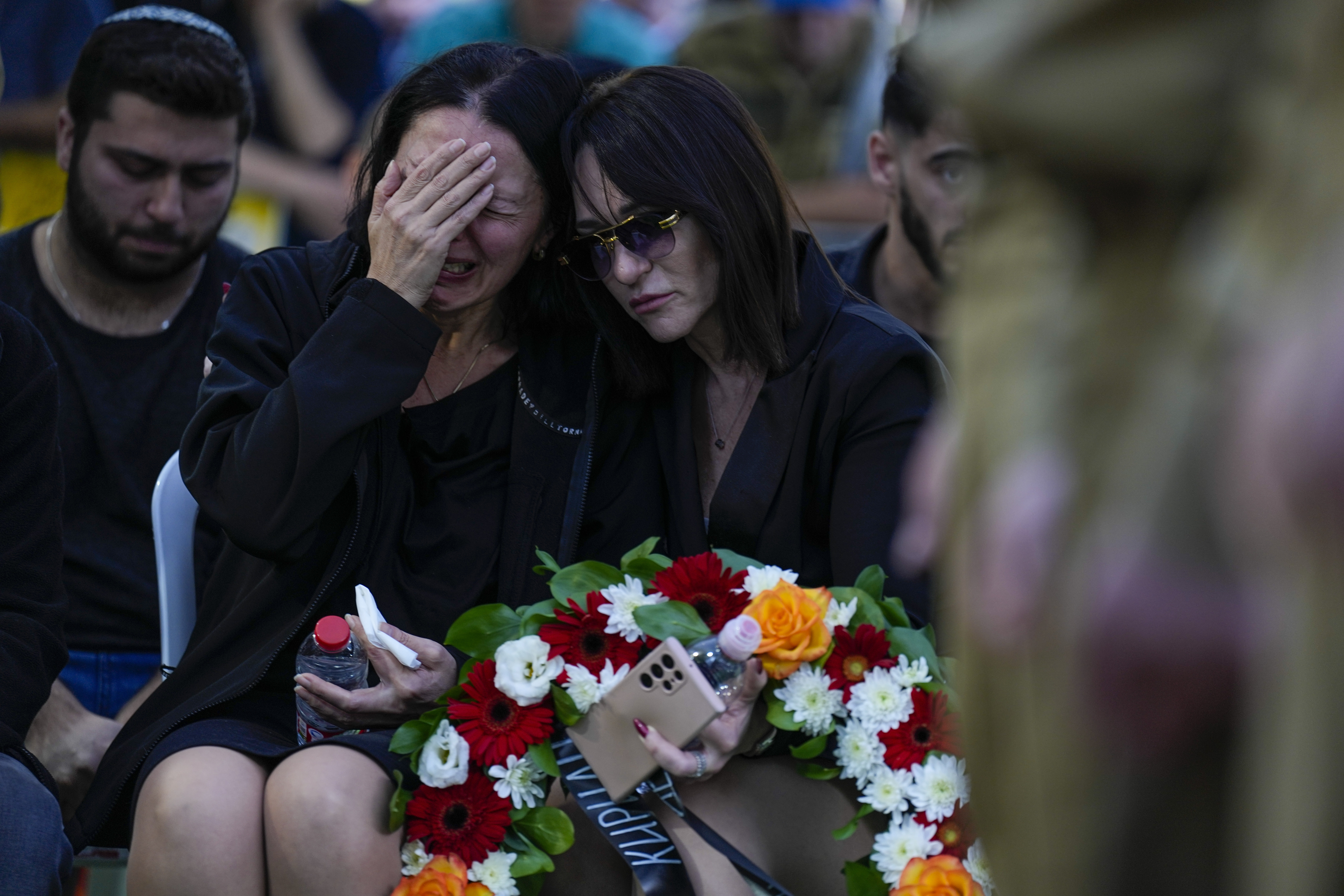 Helena Brodski cries during a memorial service for her son Sergeant Kiril Brodski in the Kiryat Shaul military cemetery in Tel Aviv. Photo / AP