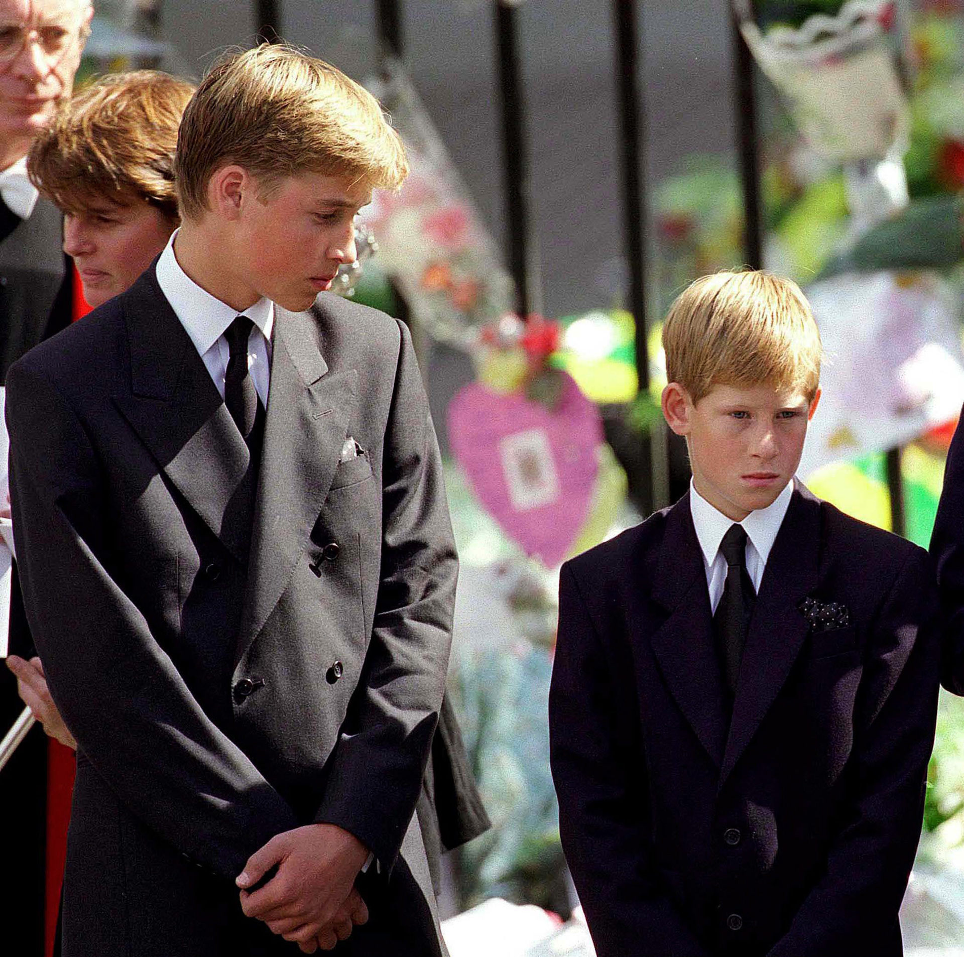 Prince William and Prince Harry stand outside Westminster Abbey at the funeral of Diana, Princess of Wales on September 6, 1997 in London, England.  Photo / Getty Images