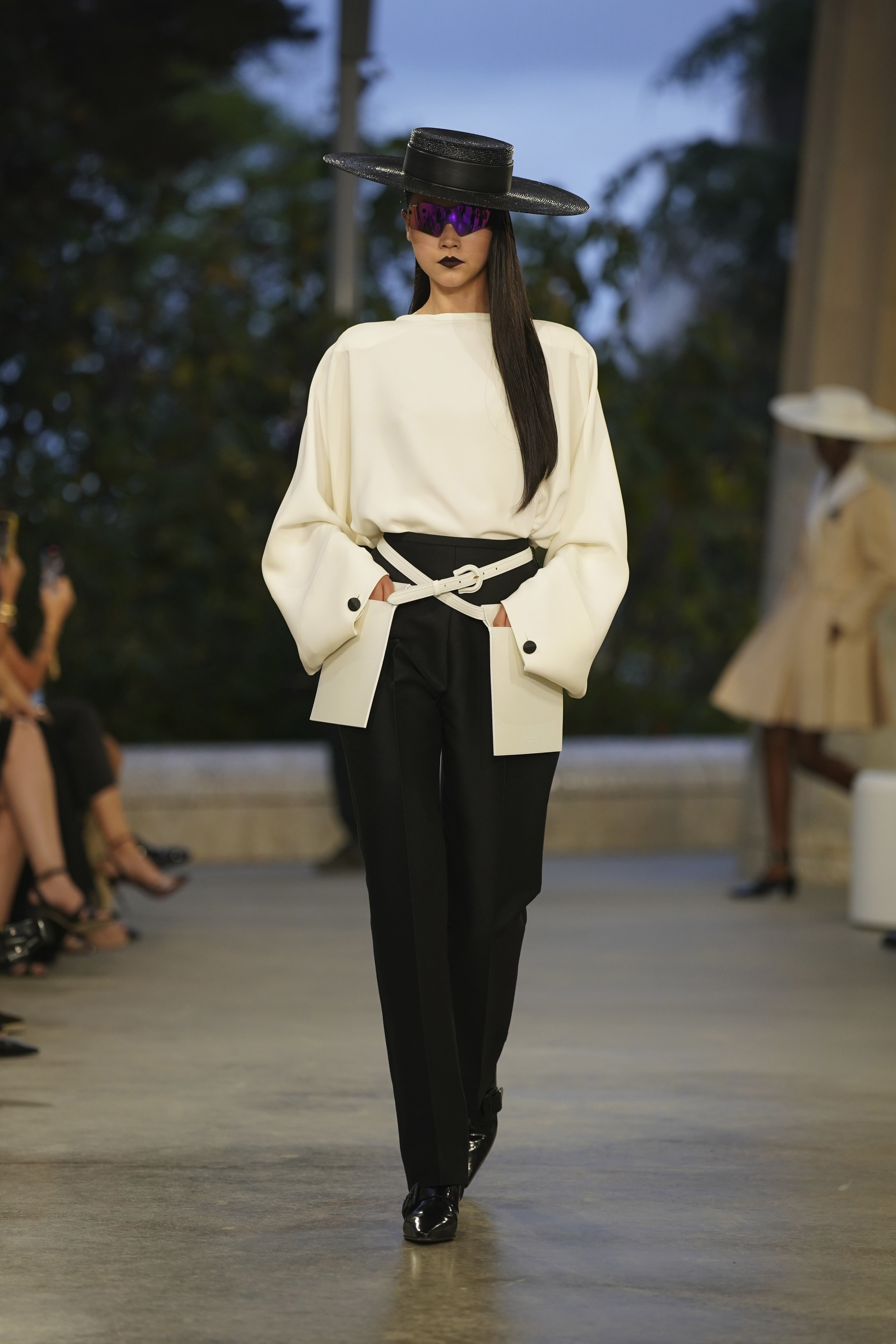 A model wears the Louis Vuitton Cruise 2025 collection in the Park Guell in Barcelona, Spain. Photo / AP
