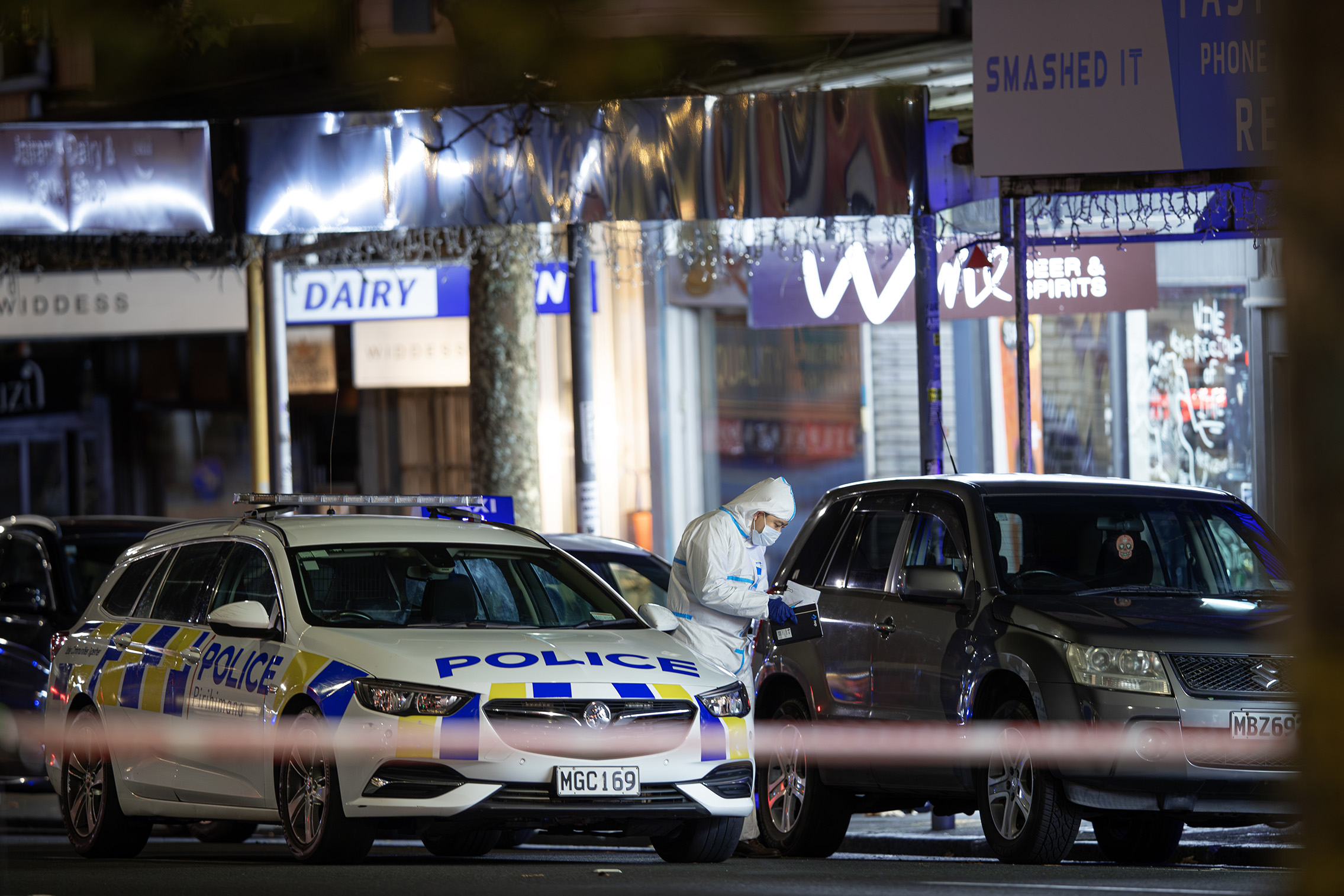 Police at the scene of a fatal shooting on Ponsonby Rd on Sunday evening. Photo / Hayden Woodward