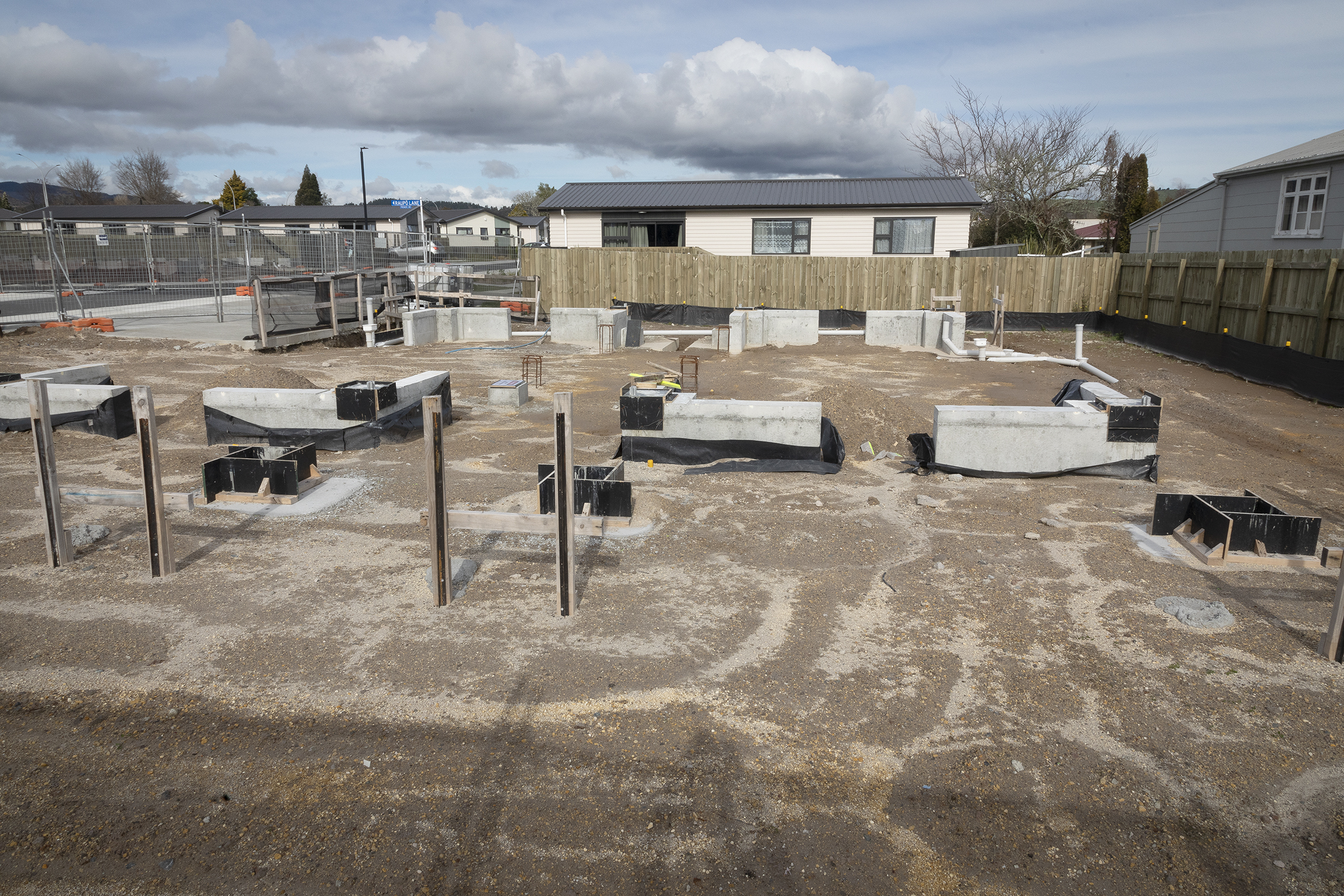 Foundations have been laid ready for three two-storey blocks containing a total of 12 homes. Photo / Andrew Warner