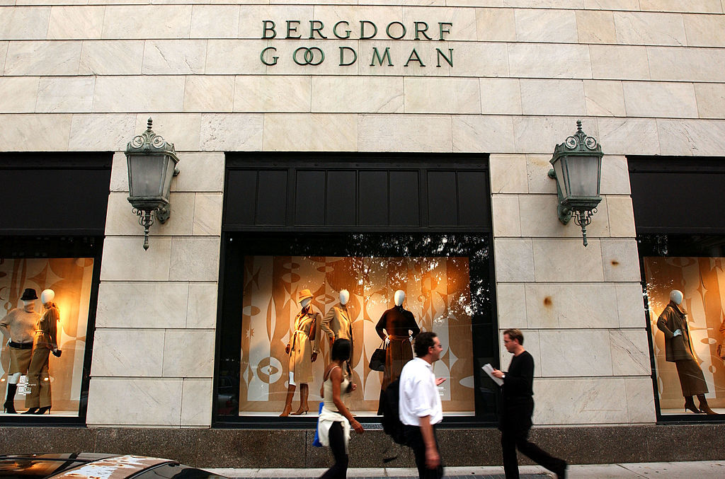 People walk past a window display at the luxury clothing store Bergdorf Goodman in New York City. Photo / Getty Images