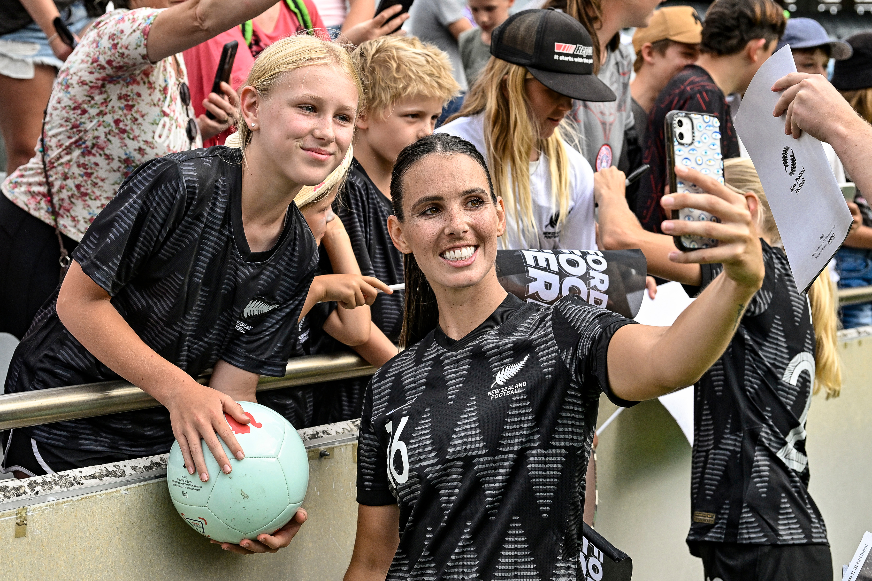 Football Fern Emma Rolston takes a selfie with fans after her team's clash with the USA at Eden Park in January. Photo / Photosport