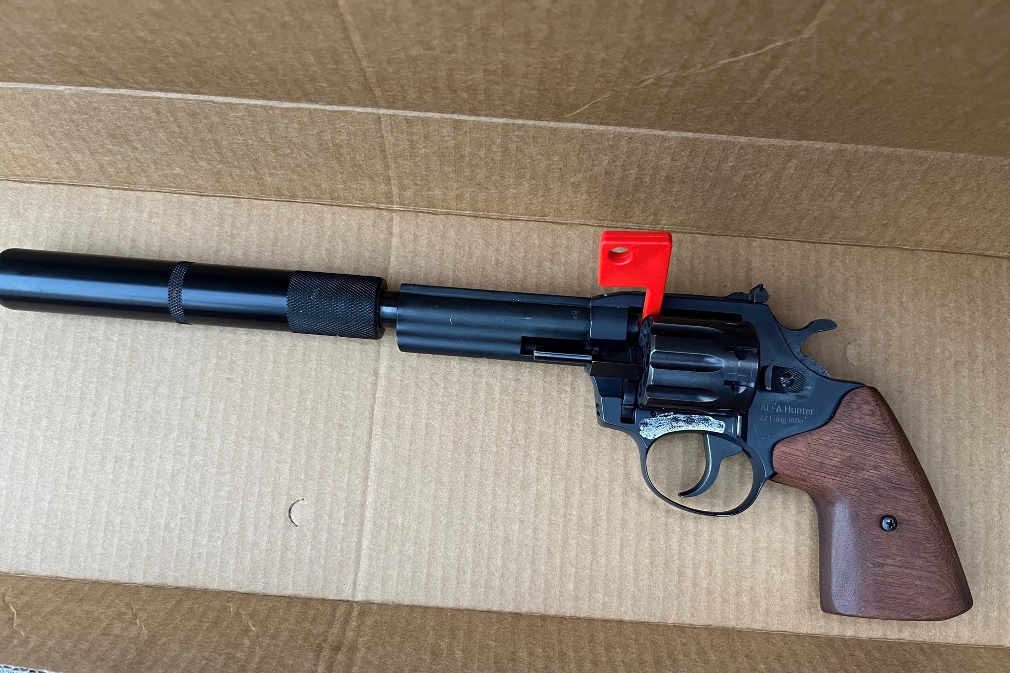 One of the men arrested was in possession of a pistol with a silencer attached. Photo / NZ Police
