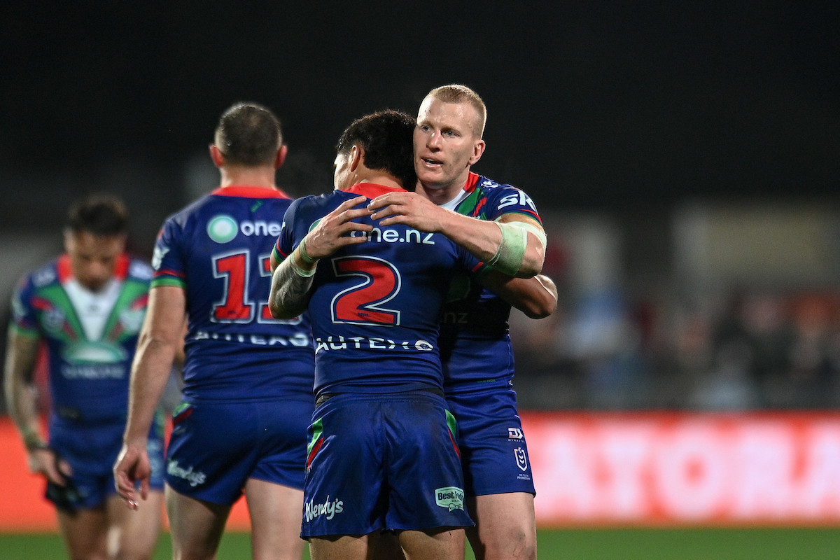 Mitch Barnett embraces Taine Tuaupiki after a match. Tuaupiki has re-signed until the end of the 2028 NRL season. Photo / Photosport