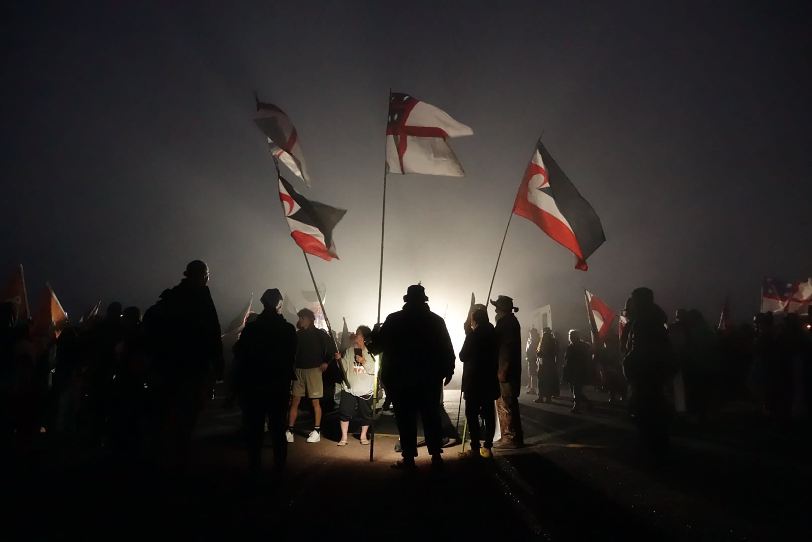 A dawn ceremony for the Hīkoi mō te Tiriti at Te Rerenga Wairau. 
Photo / Peter de Graaf