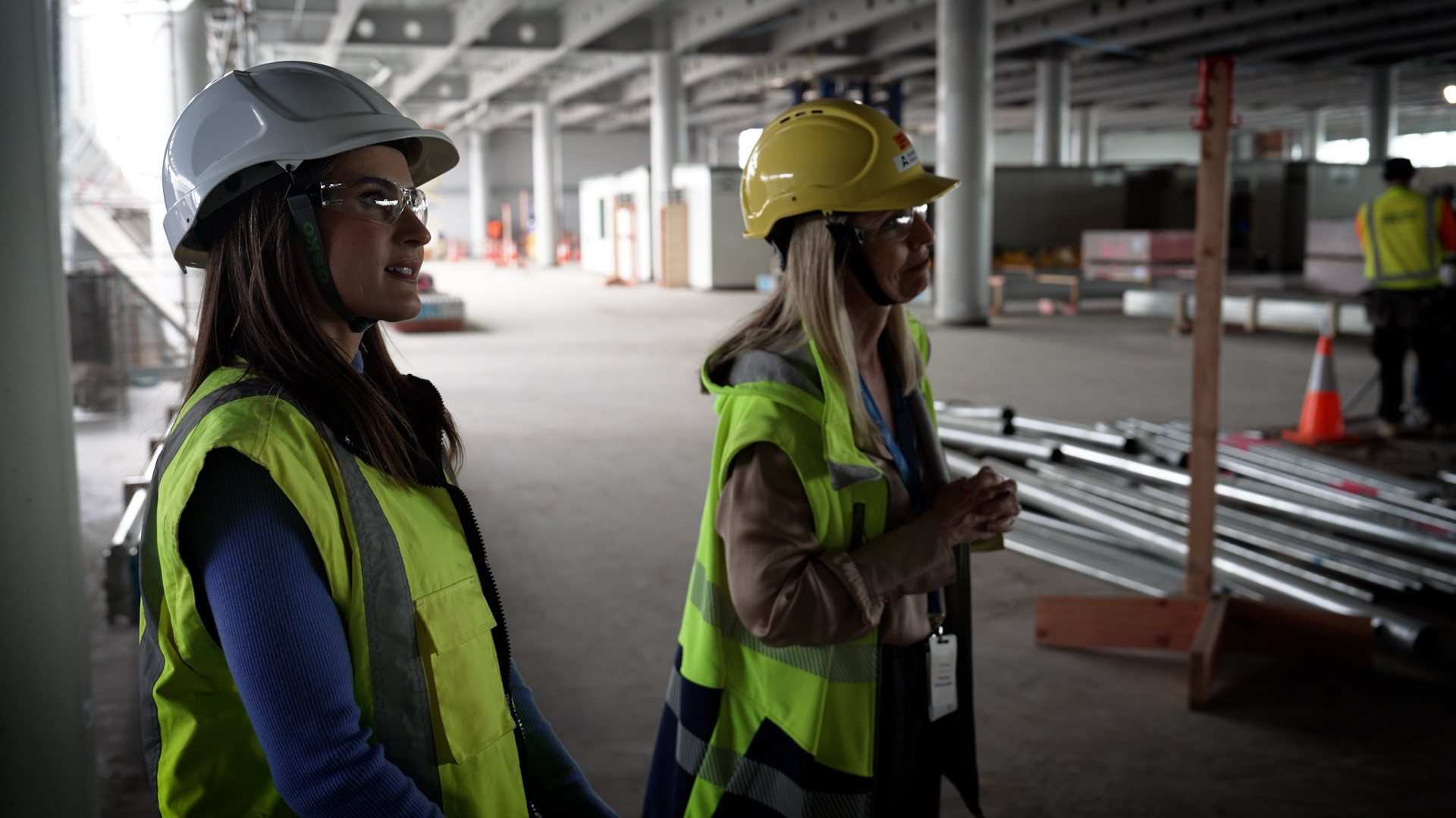 Markets with Madison (left) behind the scenes of Auckland Airport's $6 billion-plus infrastructure upgrade with chief executive Carrie Hurihanganui (right).