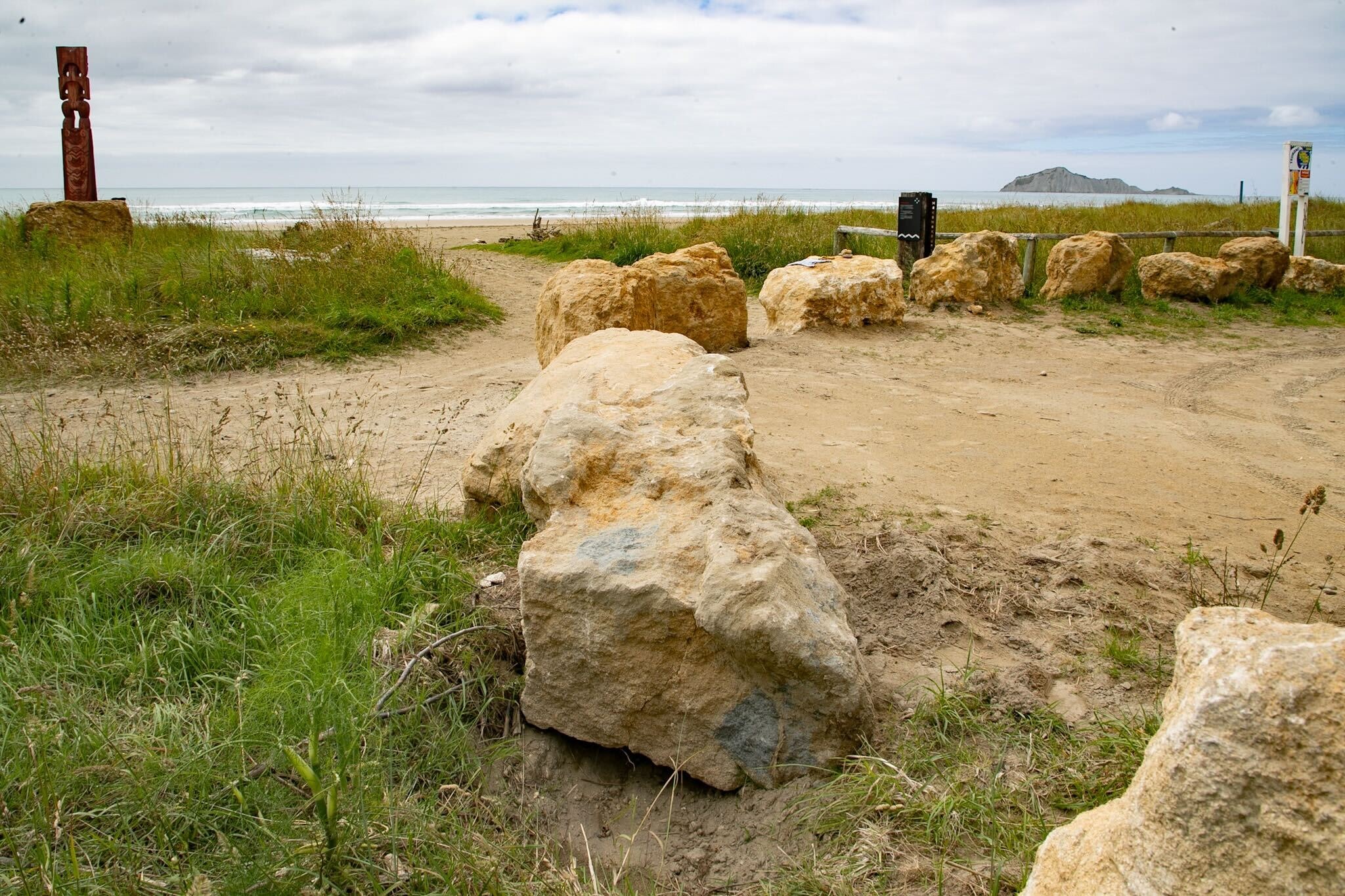 Limestone boulders have been placed to prevent vehicle access on Waimārama Beach. Photo / Warren Buckland