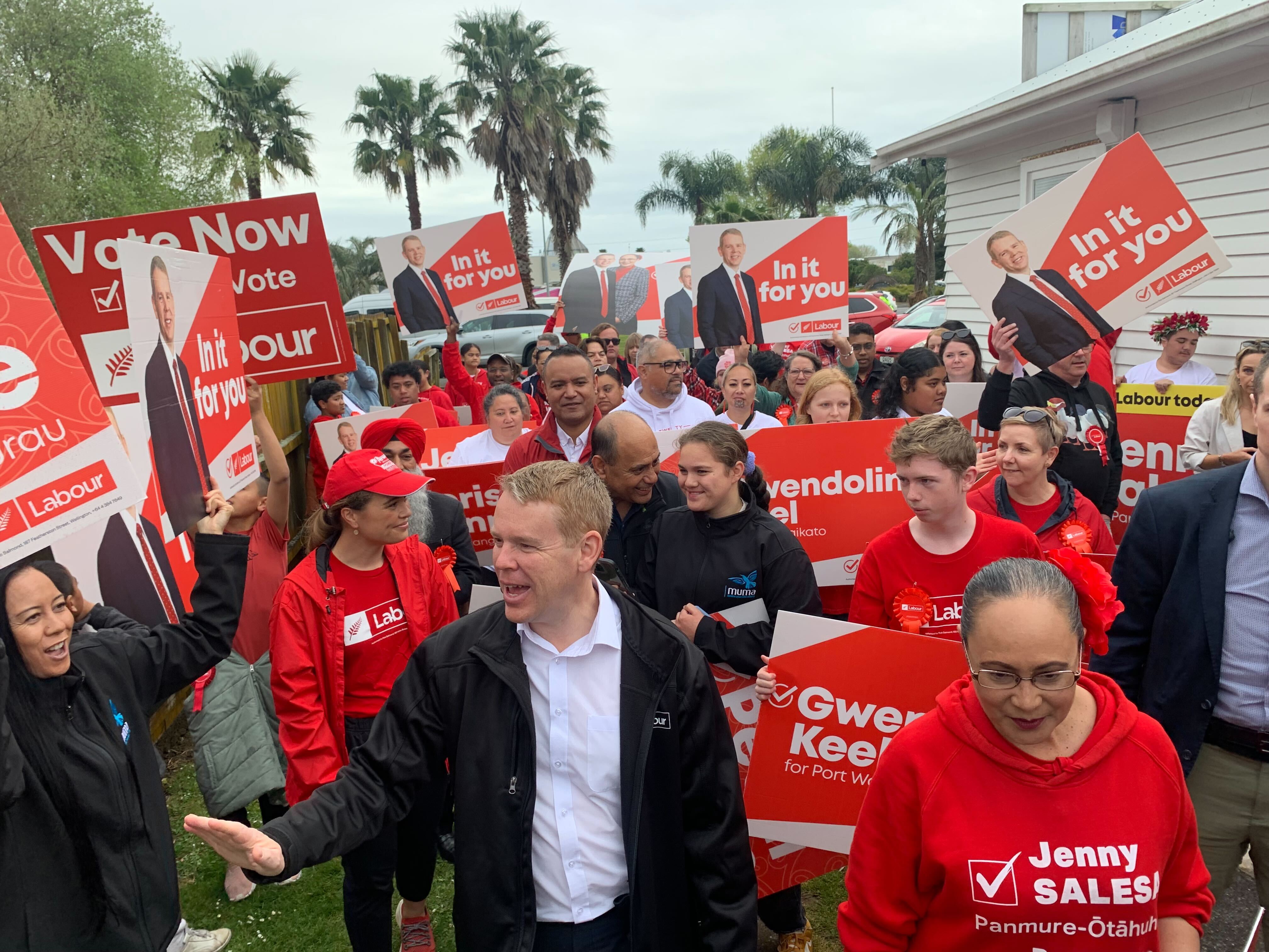 Labour leader Chris Hipkins walking through guard of honour in South Auckland. Photo / Adam Pearse