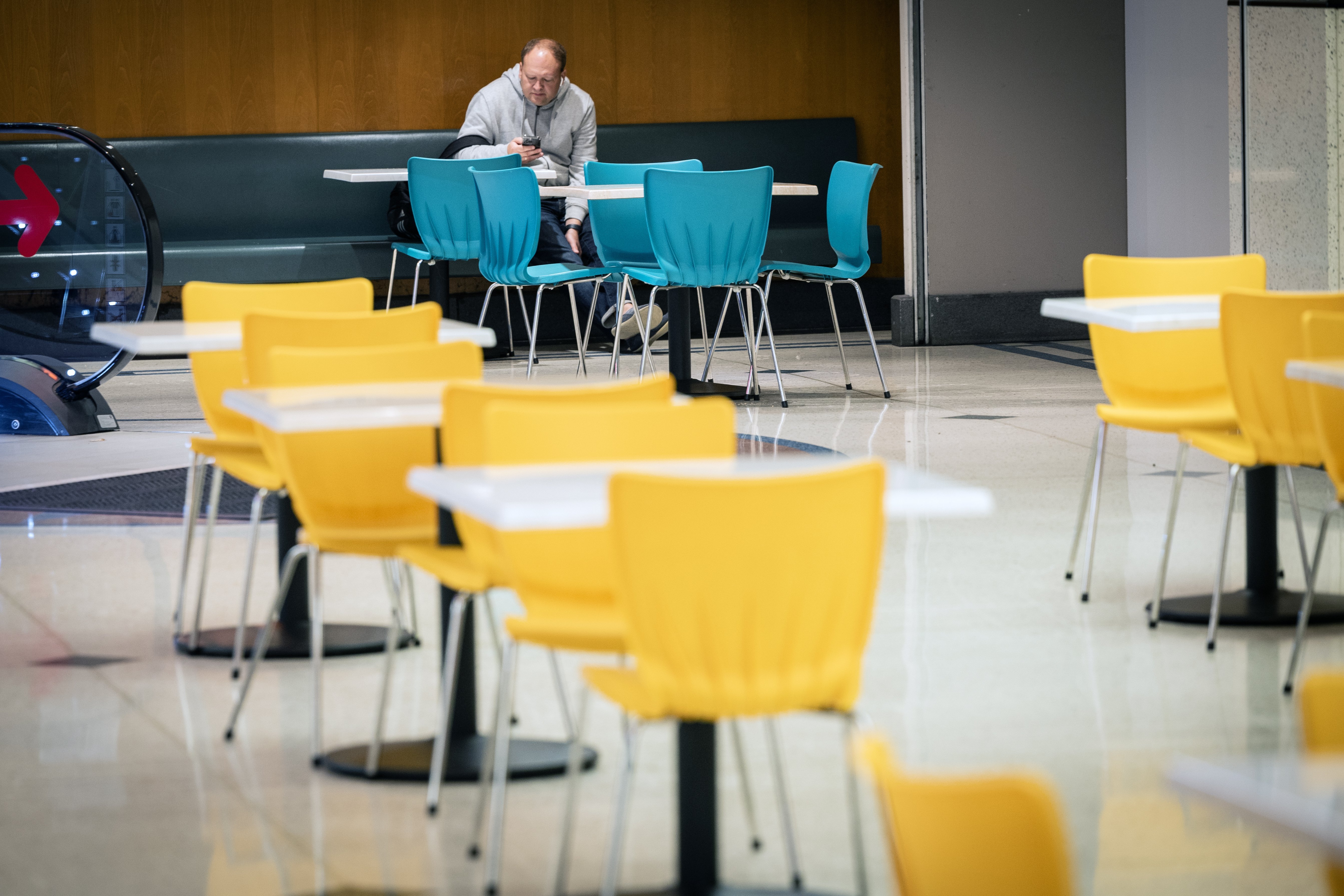 Empty tables at the food court at Atrium on Elliott as people stay away from the Auckland CBD.