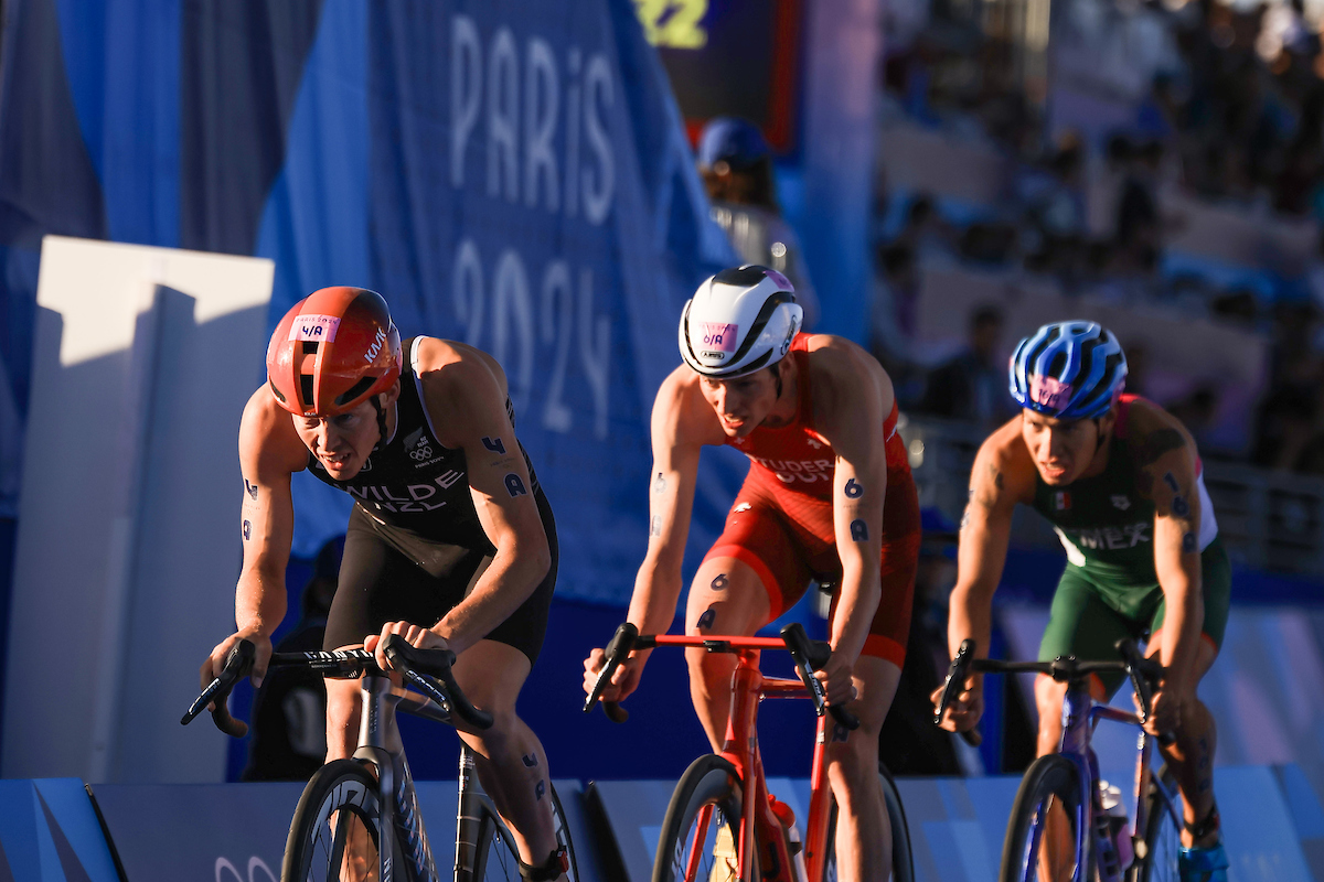 Hayden Wilde of New Zealand in the bike leg of the mixed triathlon relay race. Photo / Photosport
