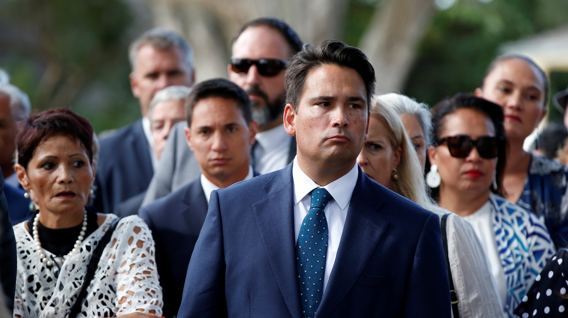 National Party leader Simon Bridges at the Waitangi Treaty Grounds, flanked by his MPs. Photo / Michael Cunningham