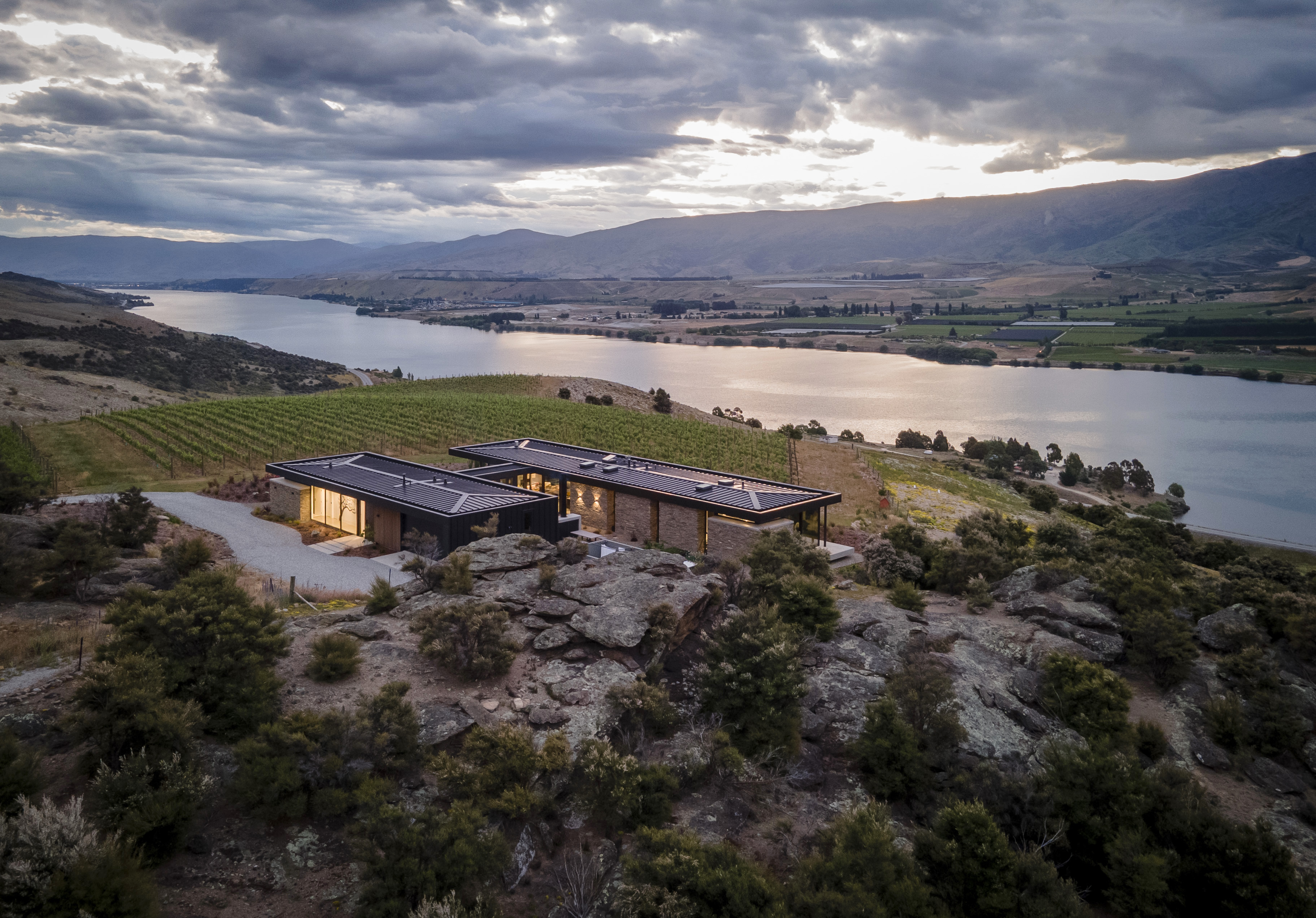 This contemporary high-end two-pavilion home is all about engaging with its mountain setting. Photo / Simon Larkin