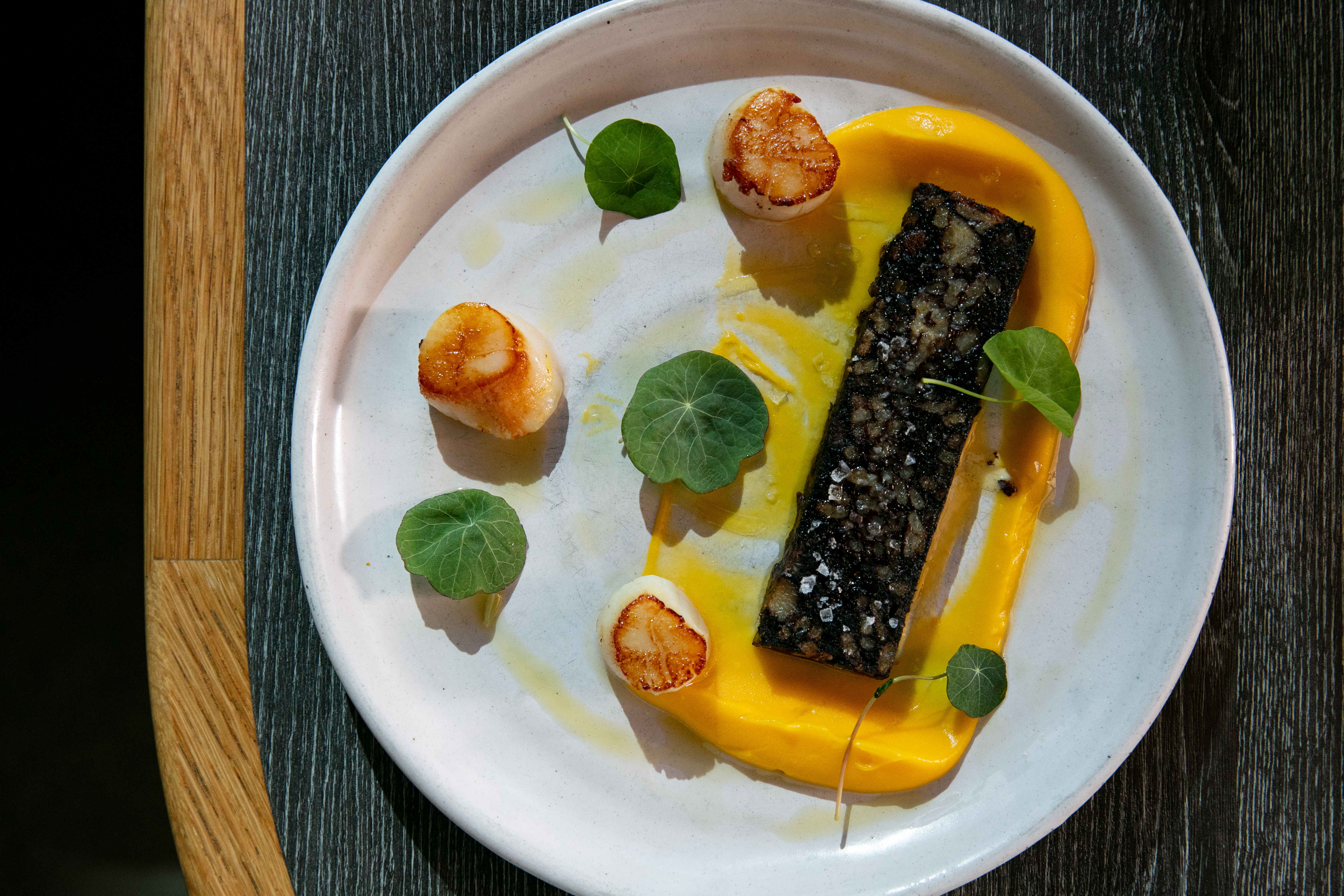 The scallops with black pudding. Photo / Babiche Martens