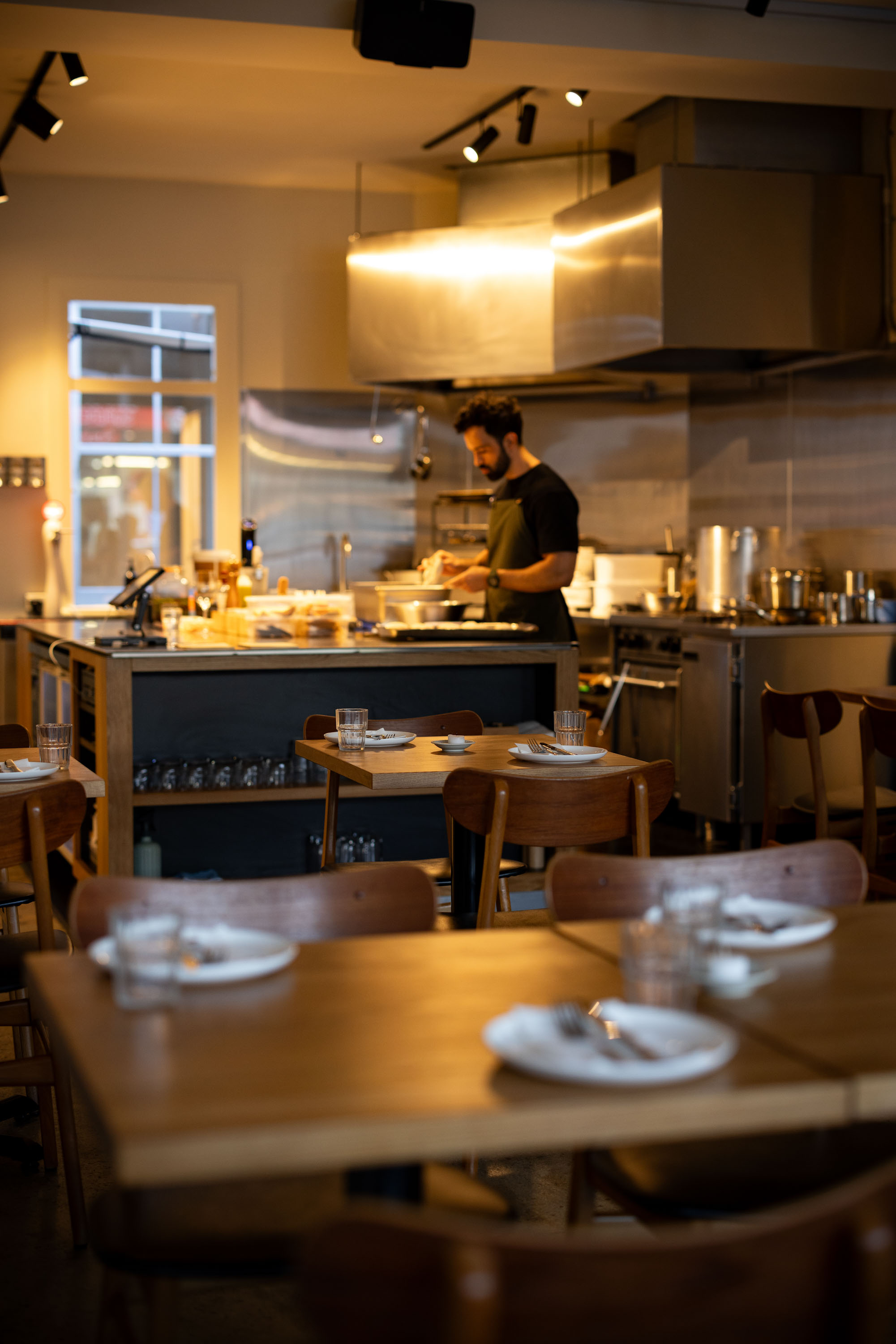 Chef Gleber Chaparro works in the open-plan kitchen. Photo / Babiche Martens