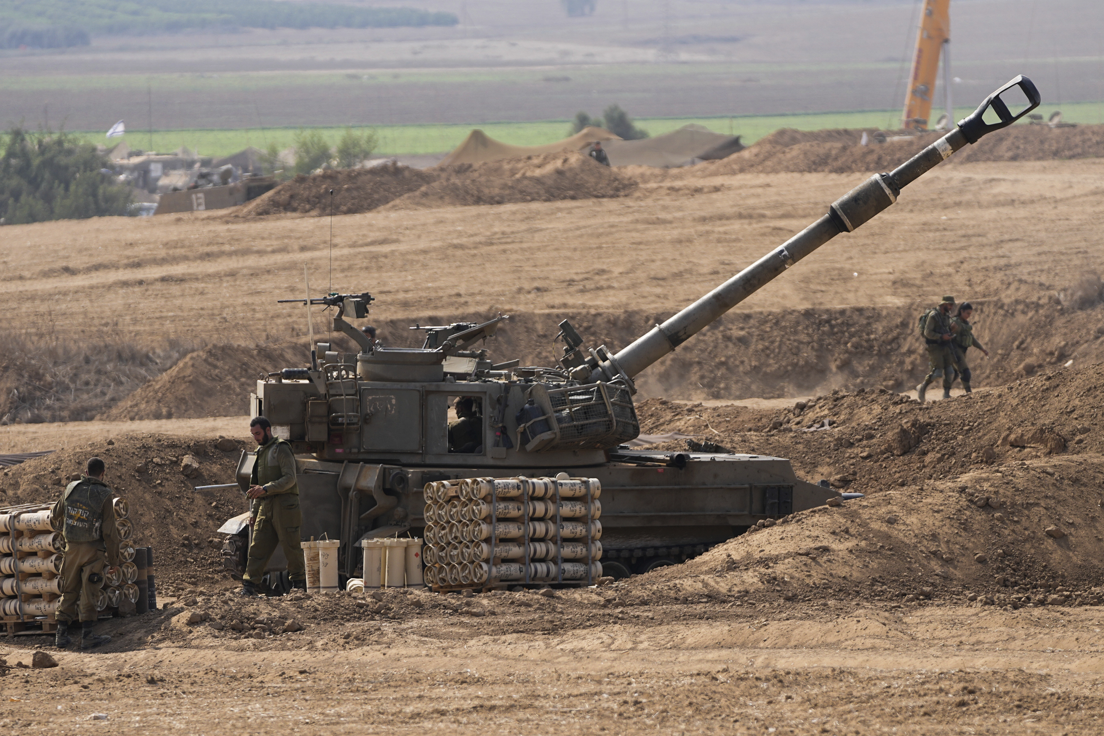 An Israeli mobile artillery unit is seen in a position near the Israel-Gaza border. Photo / AP