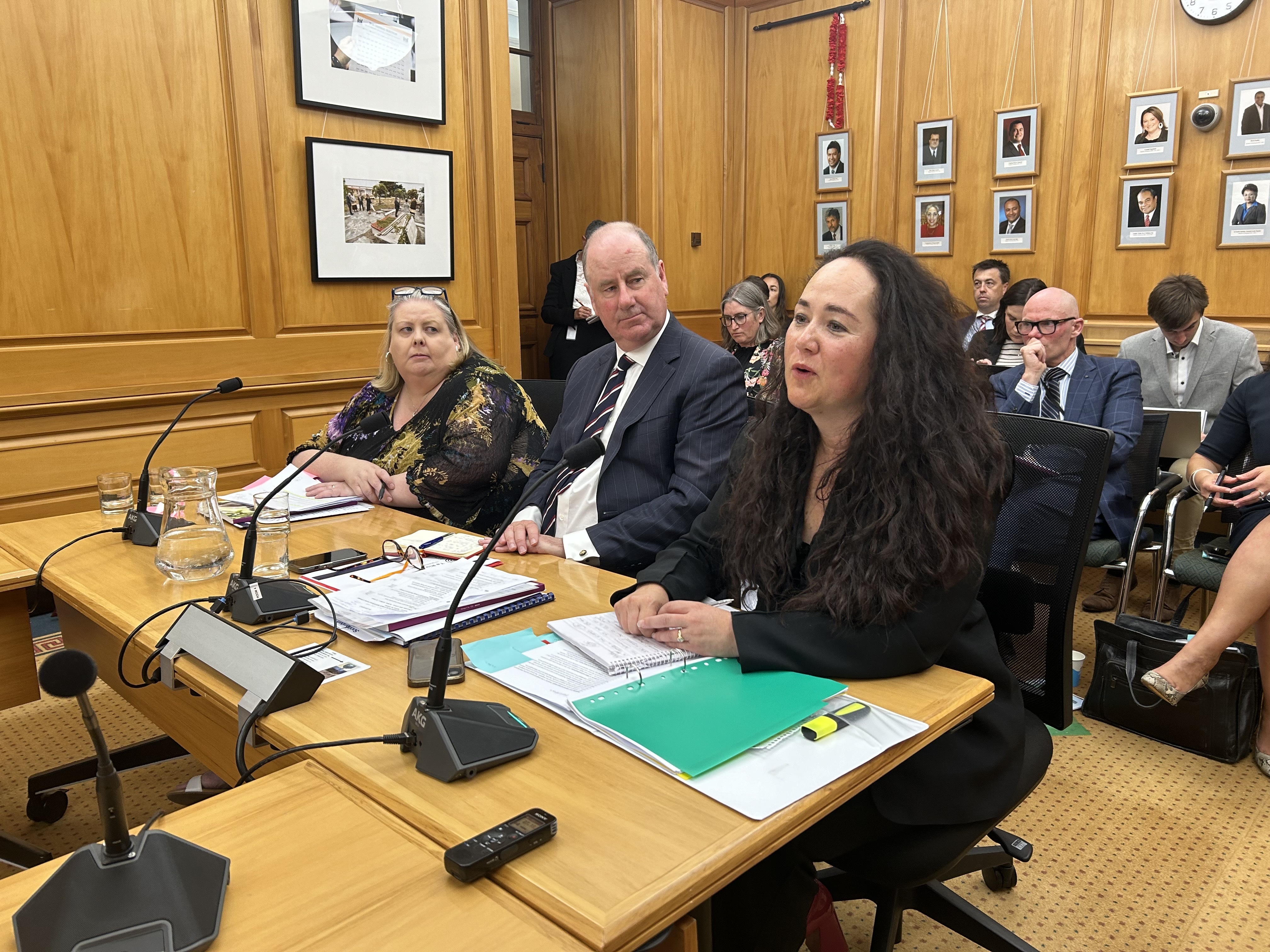 Oranga Tamariki deputy chief executive Tusha Penny (right) speaks to a Parliament select committee about the recent death of a participant in the Government's bootcamp pilot. Photo / Adam Pearse