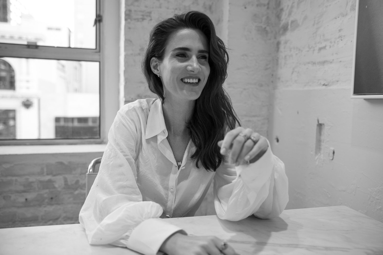 Rachel's hair hack includes fully drying her hair before tying half of it up for extra lift at the roots. Photo / Supplied