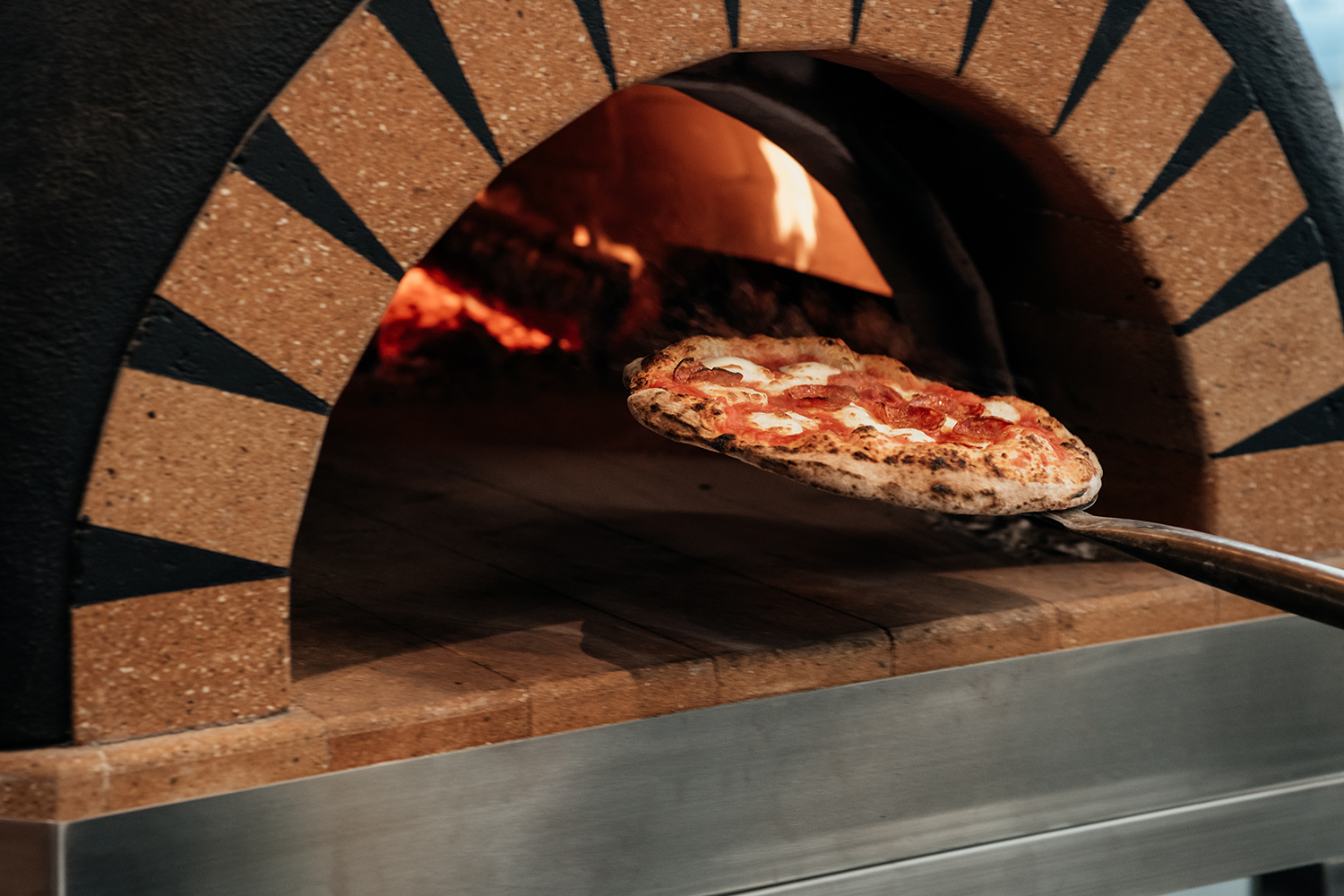 The woodfired pizza oven has pride of place in the kitchen.
