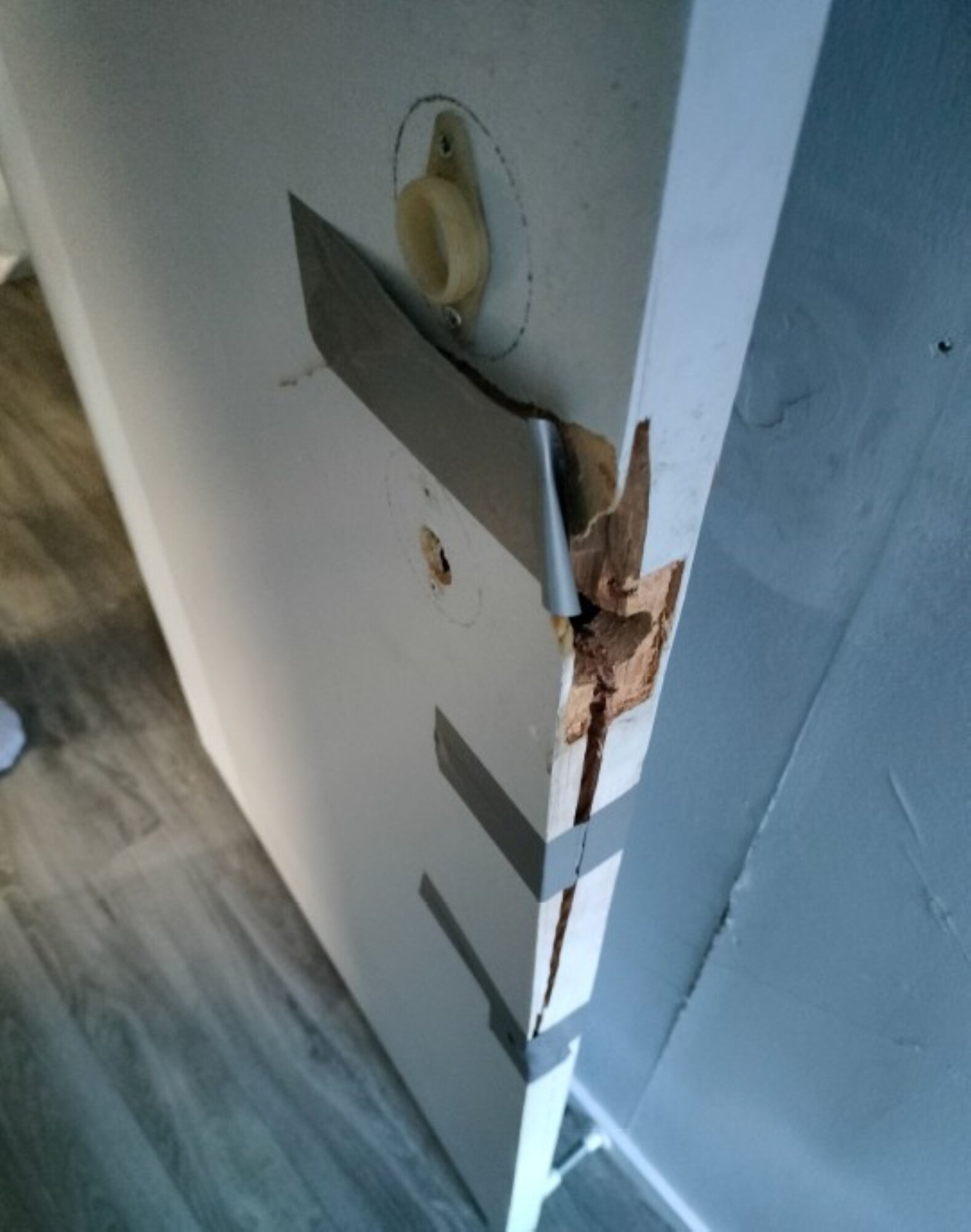 The broken toilet door in Stephen and Jasu Bhana's property.