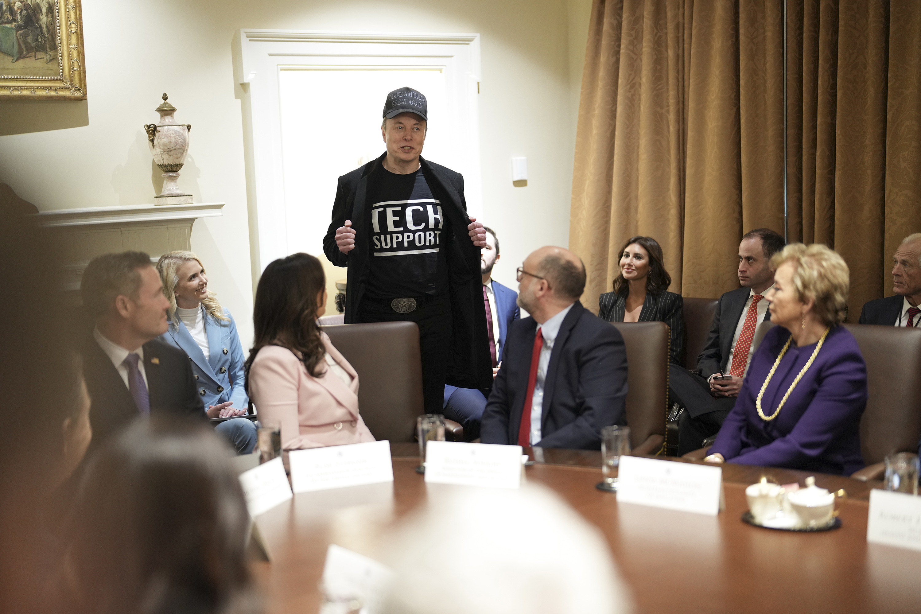 Elon Musk displays his T-shirt reading 'Tech Support' during President Donald Trump’s first Cabinet on February 26. Photo / Doug Mills, The New York Times