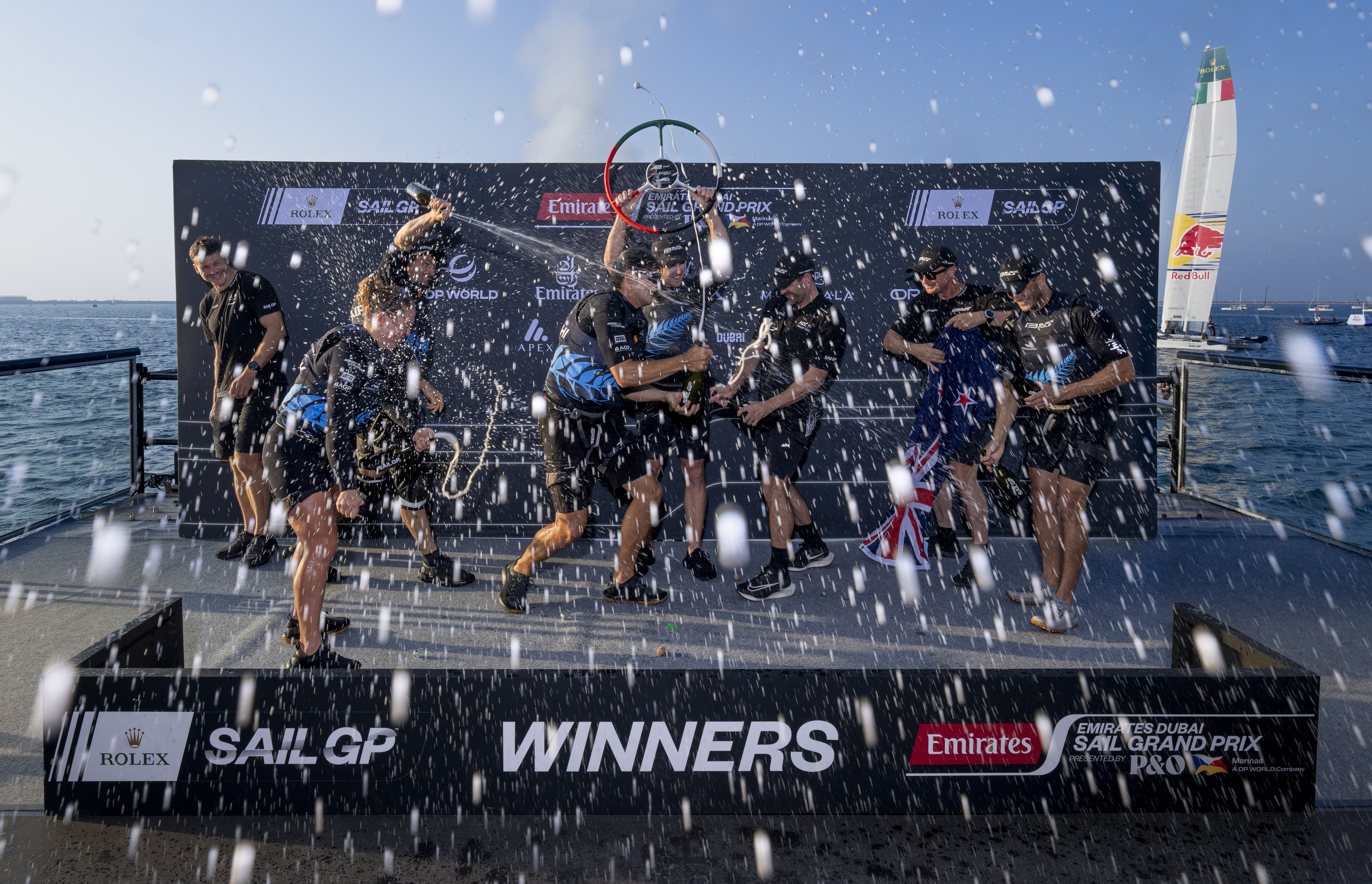 The Black Foils celebrate their win at the first SailGP regatta of the new season. Photo / Christopher Pike, SailGP