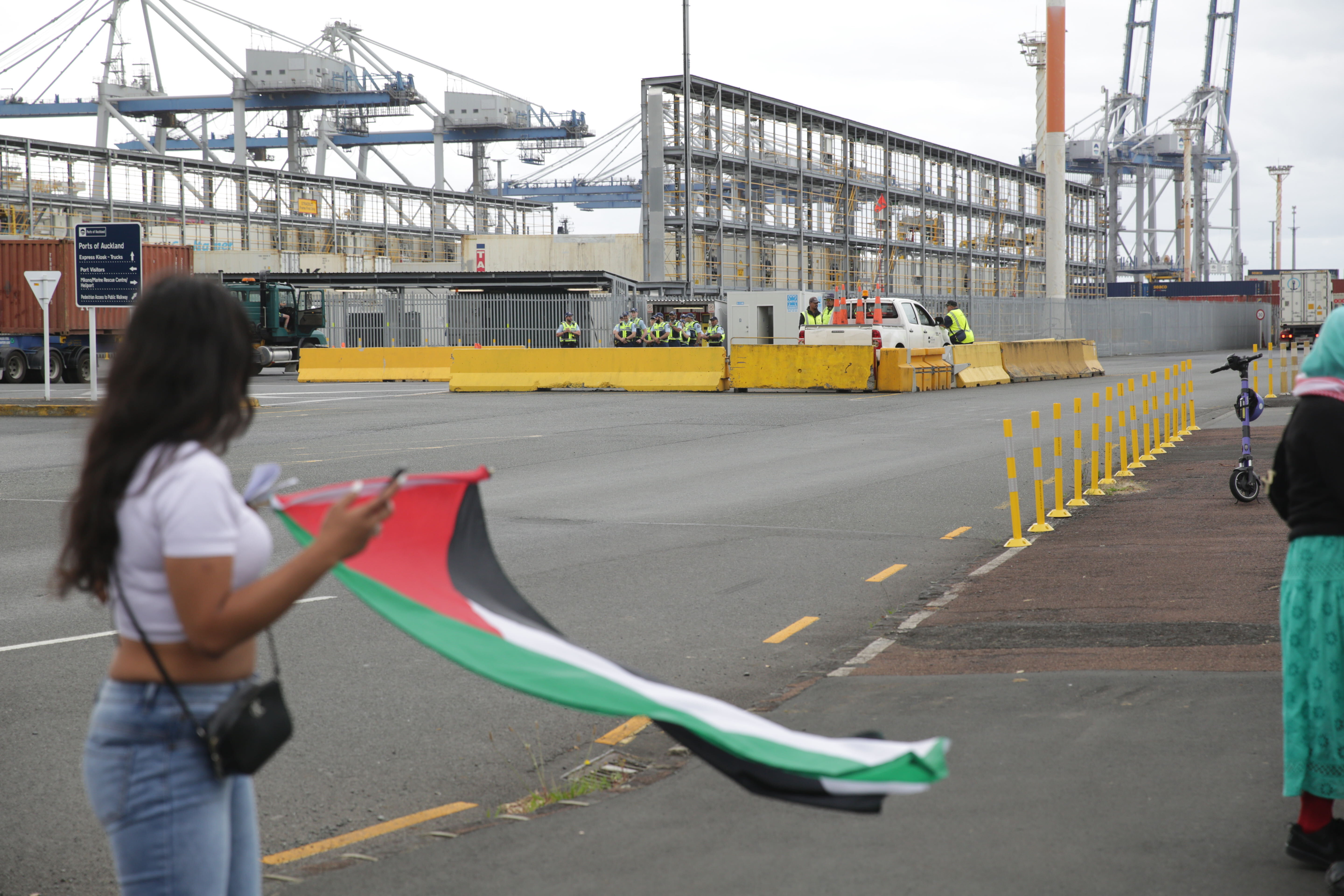 Police stand guard at the entrance of the Port of Auckland. Photo / Sylvie Whinray