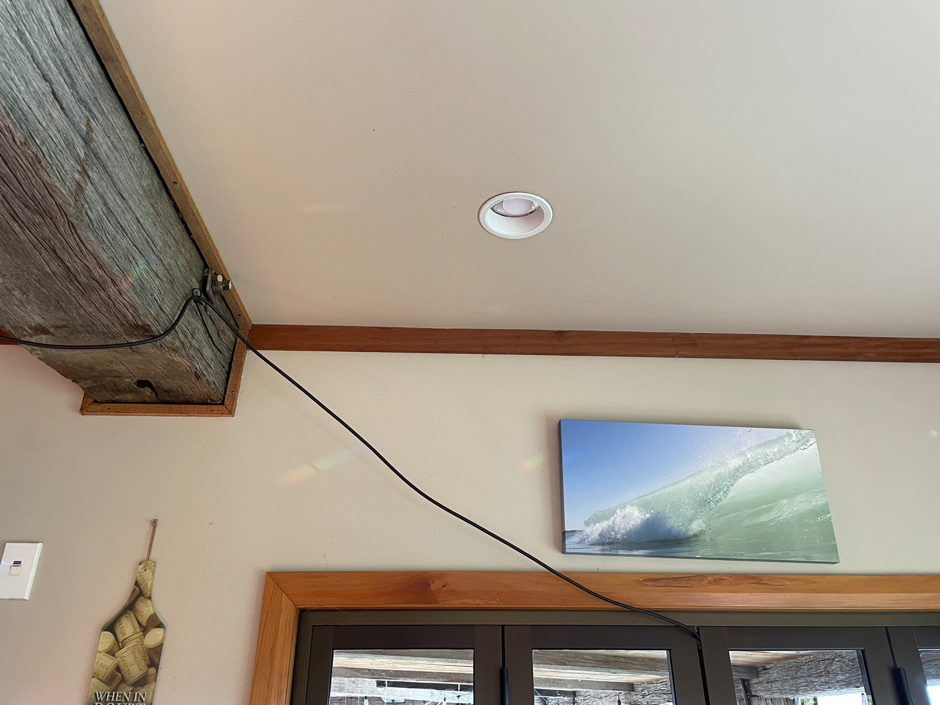 A Starlink kit comes with a dish, 30m of cable and a wi-fi router. With the DIY install process, Frampton currently has the cable snaking through his kitchen. Photo / Supplied