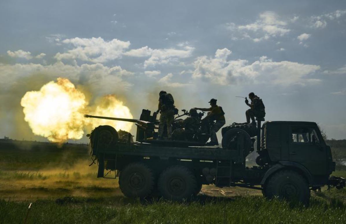 Ukrainian soldiers fire a cannon near Bakhmut in the Donetsk region, Ukraine. Photo / AP